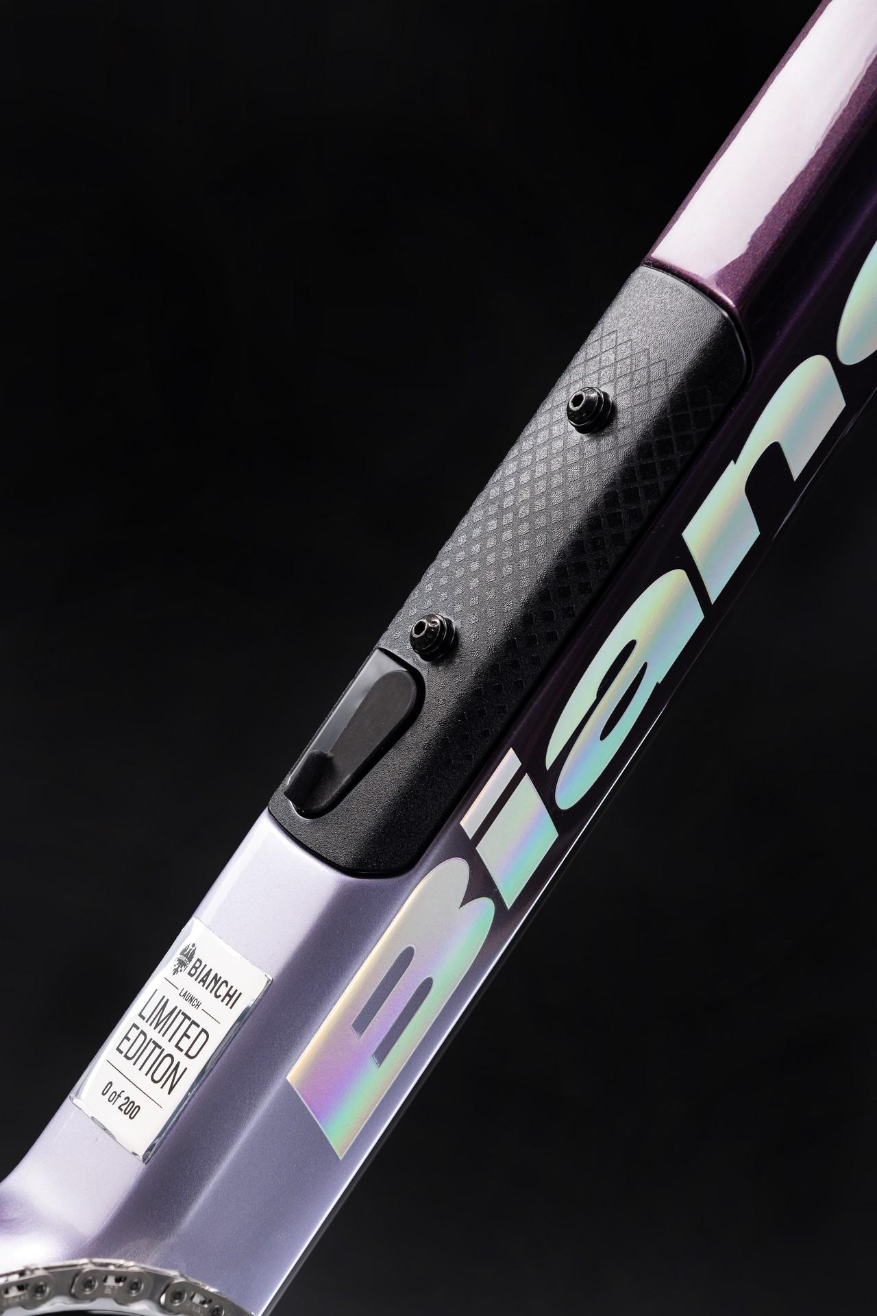 Close-up of the integrated carbon storage hatch on a limited edition Bianchi Infinito road bike frame.