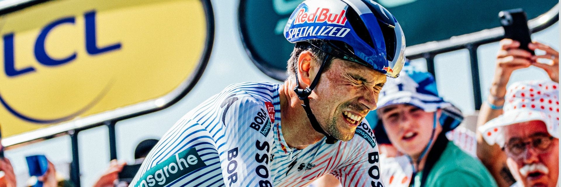 Primoz Roglic strains over his handlebars during the Tour de France stage 13 time trial.