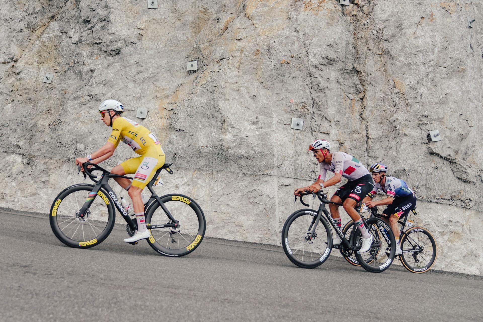 Tadej Pogačar rides in a breakaway as Isaac del Toro and Remco Evenepoel chase during Tour de France stage