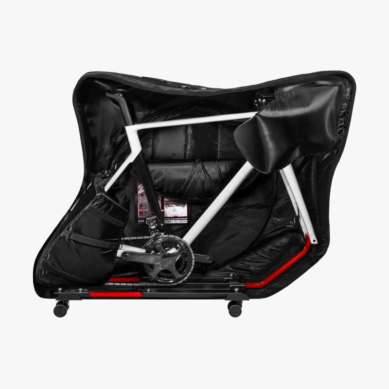 SciCon AeroComfort 3.1 XP bike travel bag open showing Frame Defender stand and road bike packed inside