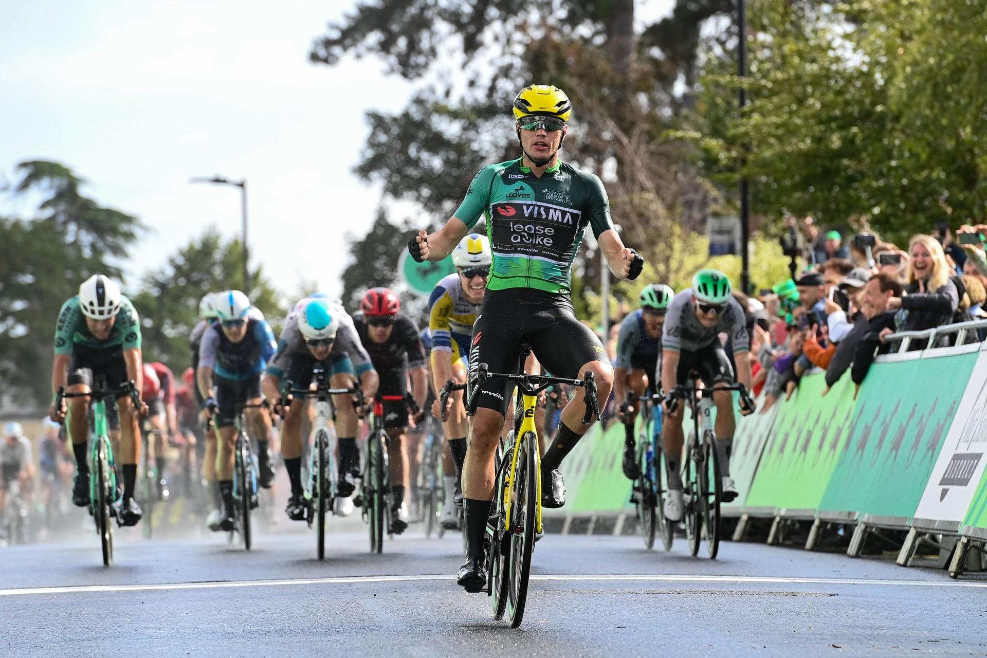 Olav Kooij leads the peloton to win Stage 2 of the Tour of Britain.