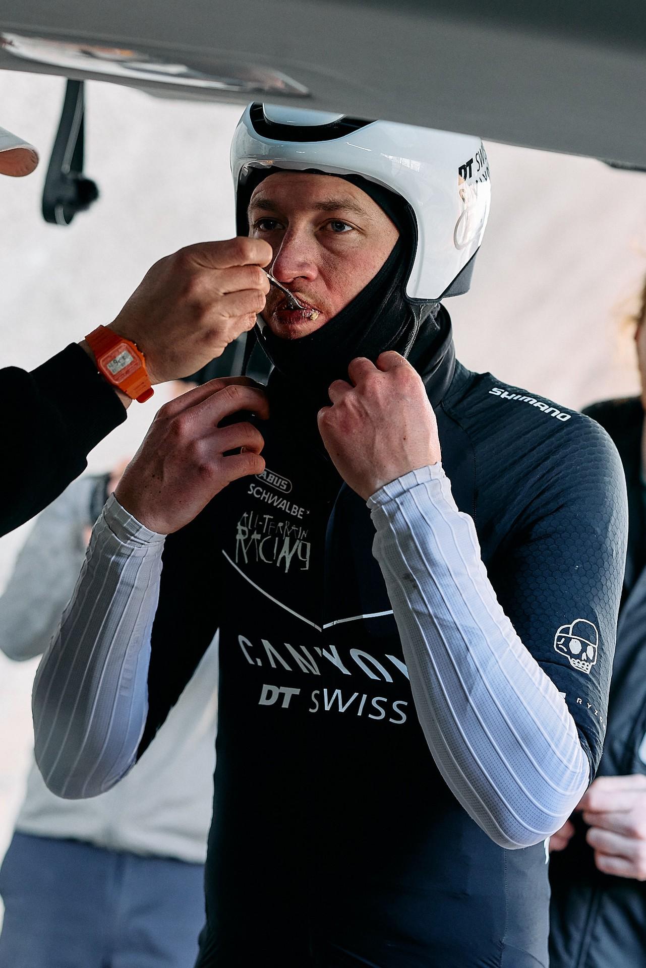 Alex McCormack taking on food during his record attempt