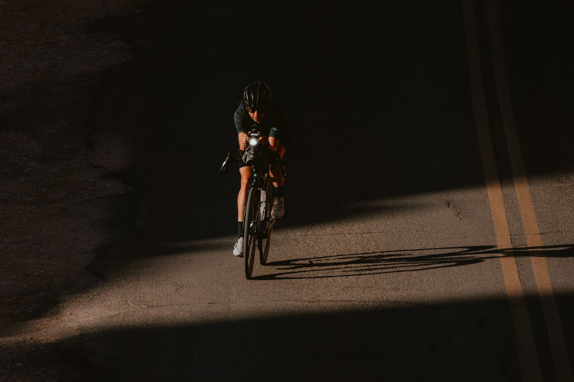 Lael Wilcox abandons around-the-world record bid after 14 days as European heatwave triggers heat exhaustion