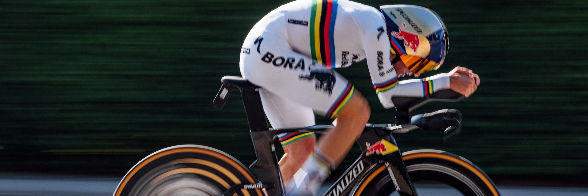 Remco Evenepoel races a time trial bike during the 2026 Tour de France.