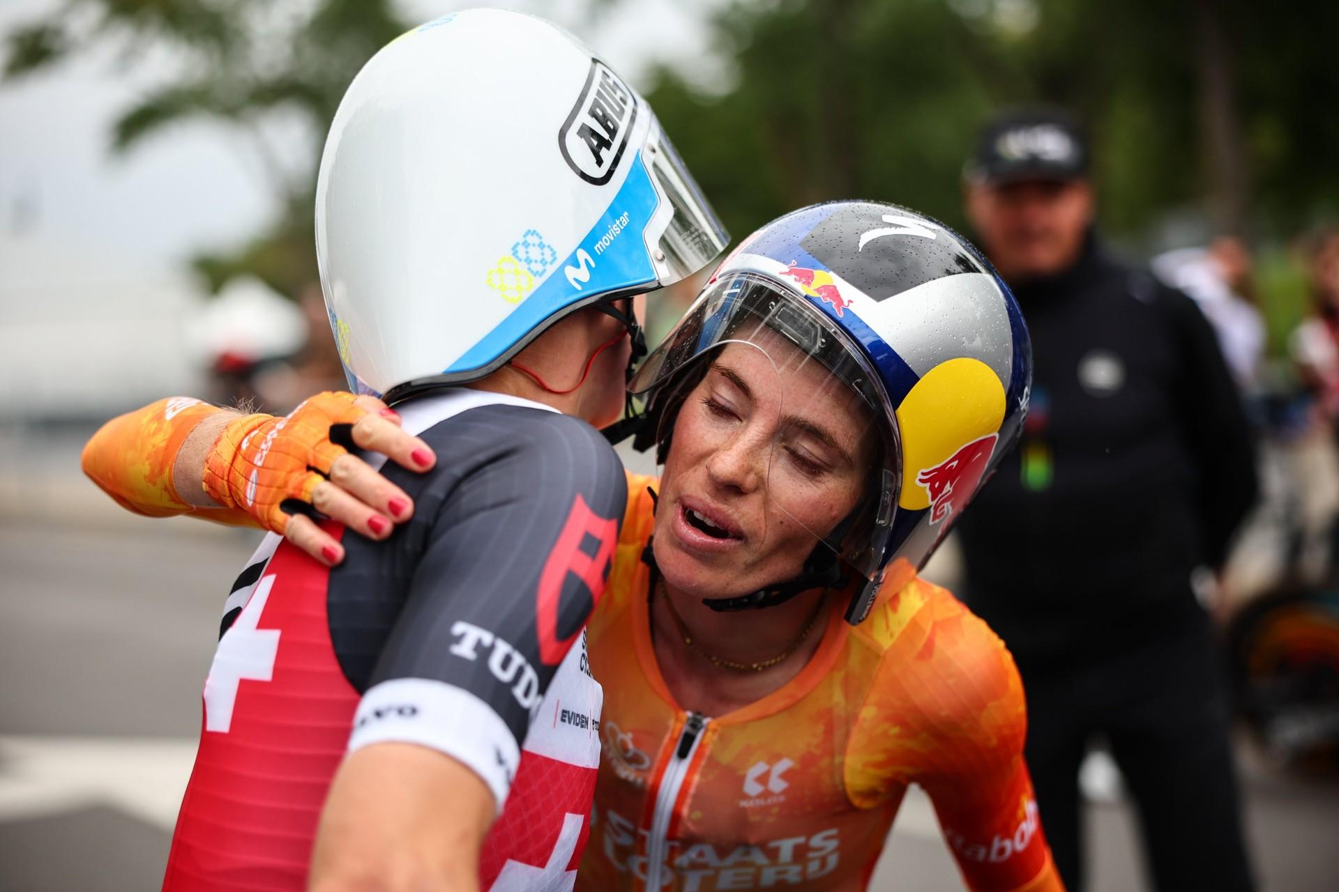 Demi Vollering and Marlen Reusser embrace after the women's world time trial in Montréal.