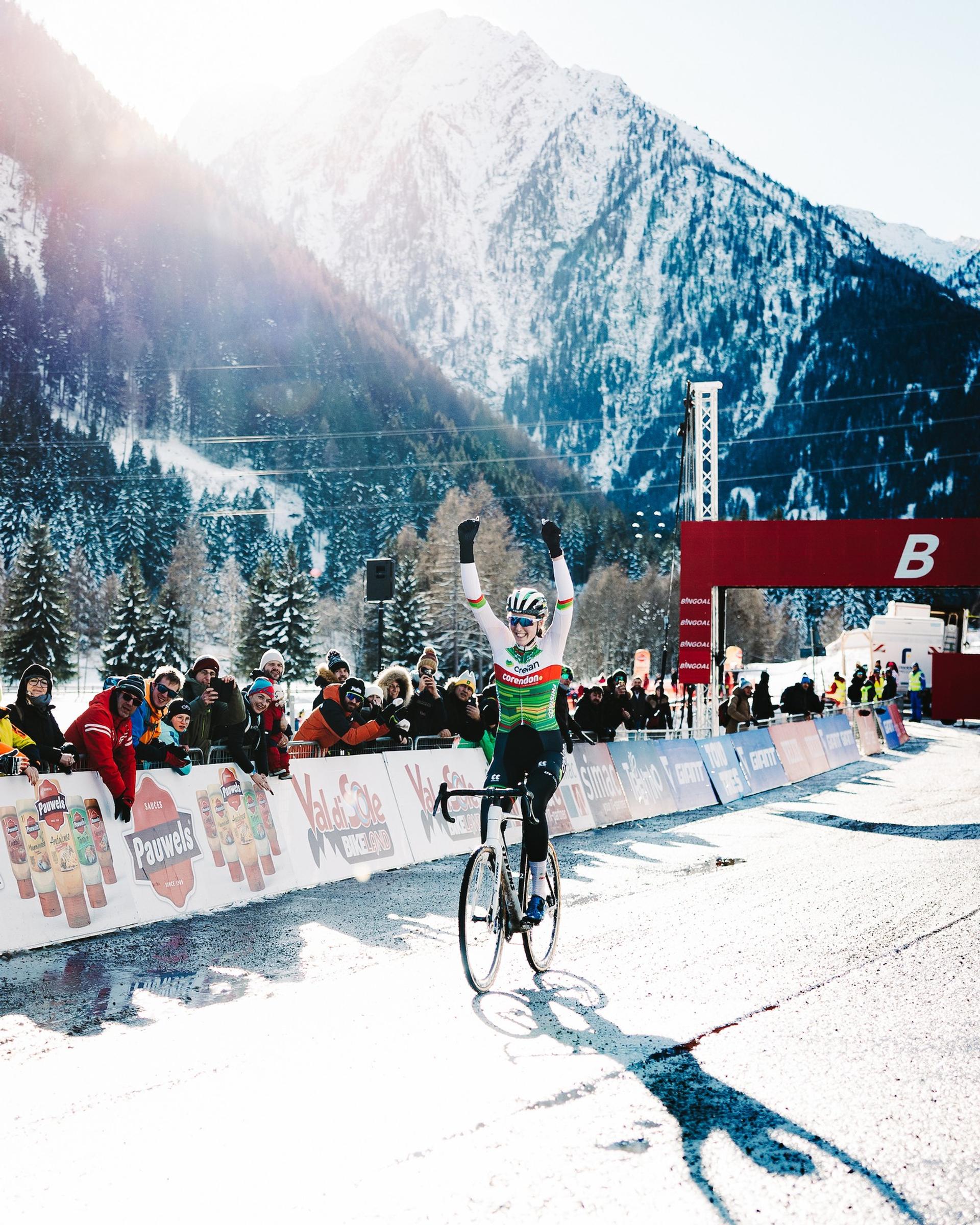 Manon Bakker celebrates winning the UCI Cyclo-cross World Cup Elite Women's race in snowy Val di Sole, Italy.