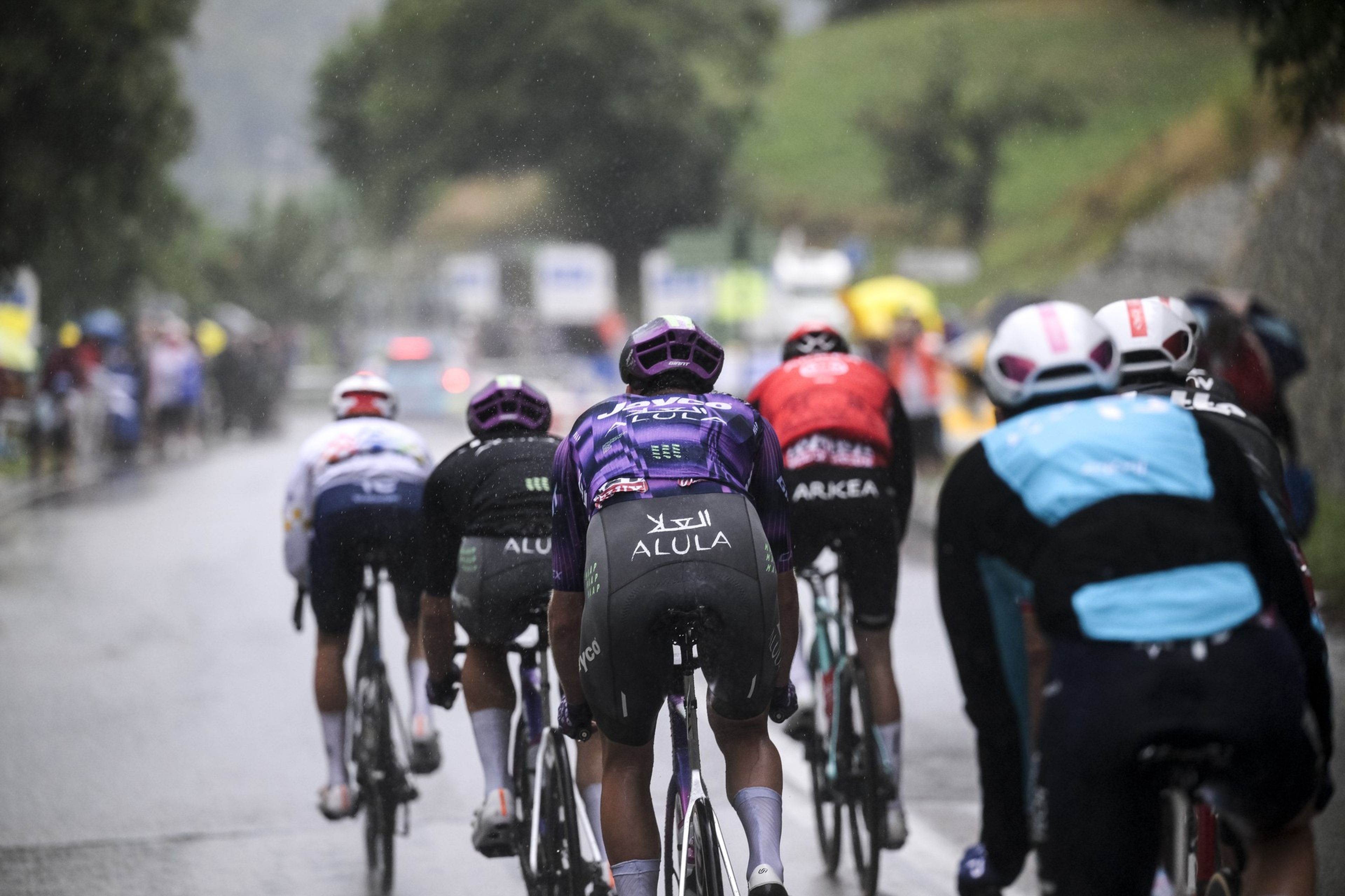 Dense spectator crowds at La Plagne hairpin, Tour de France climb