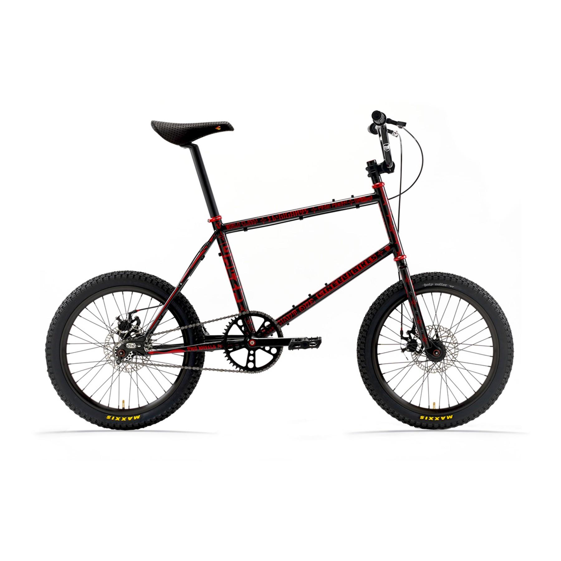 Side view of a red-and-black Cinelli Tutto Mini singlespeed bike with 20-inch wheels against a white background.
