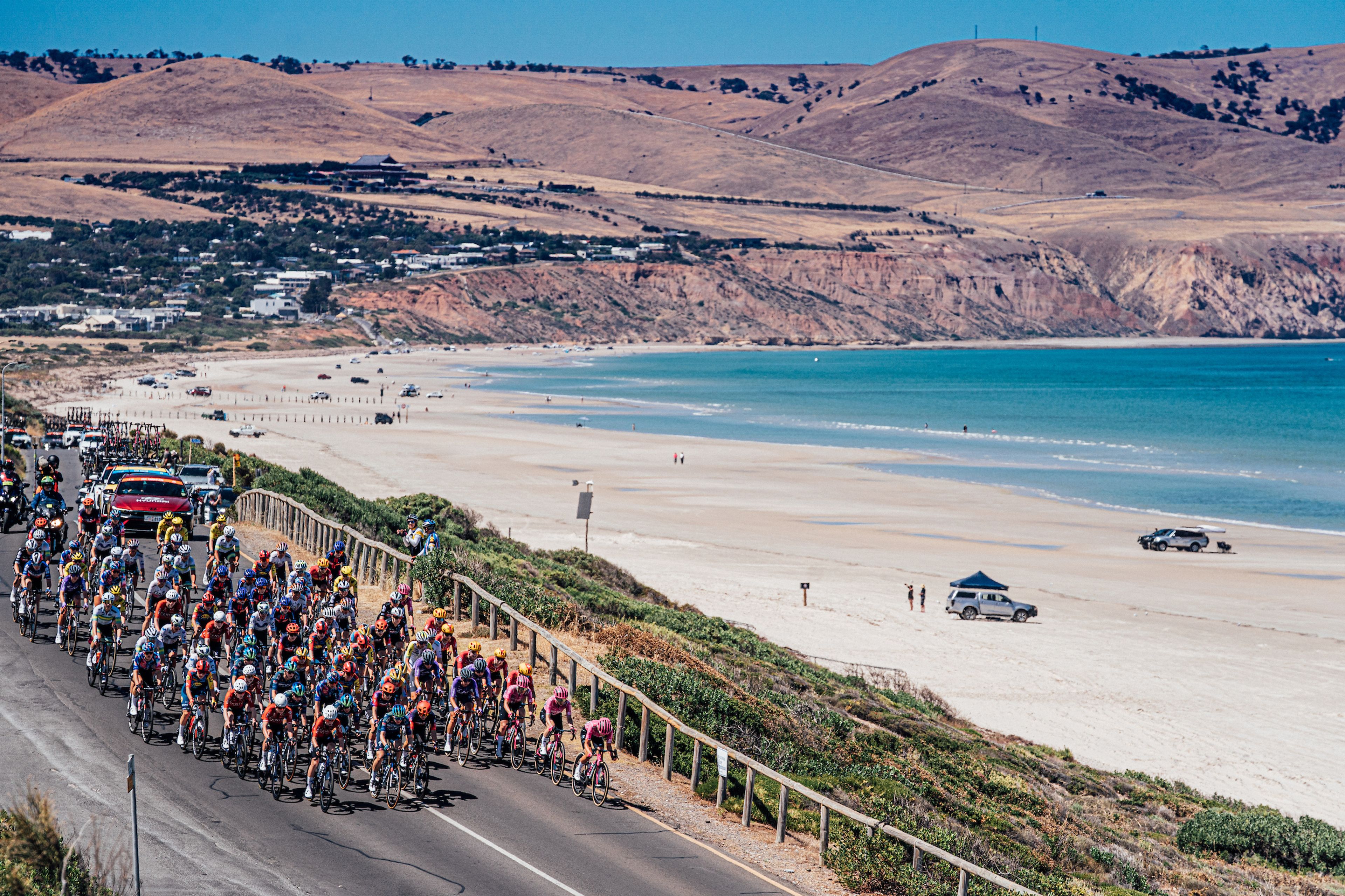 Picture by Zac Williams/SWpix.com - 17/01/2026 - Cycling - 2026 Women's Tour Down Under Stage 1 - Willunga to Willunga - The peloton ride past Aldinga Beach.