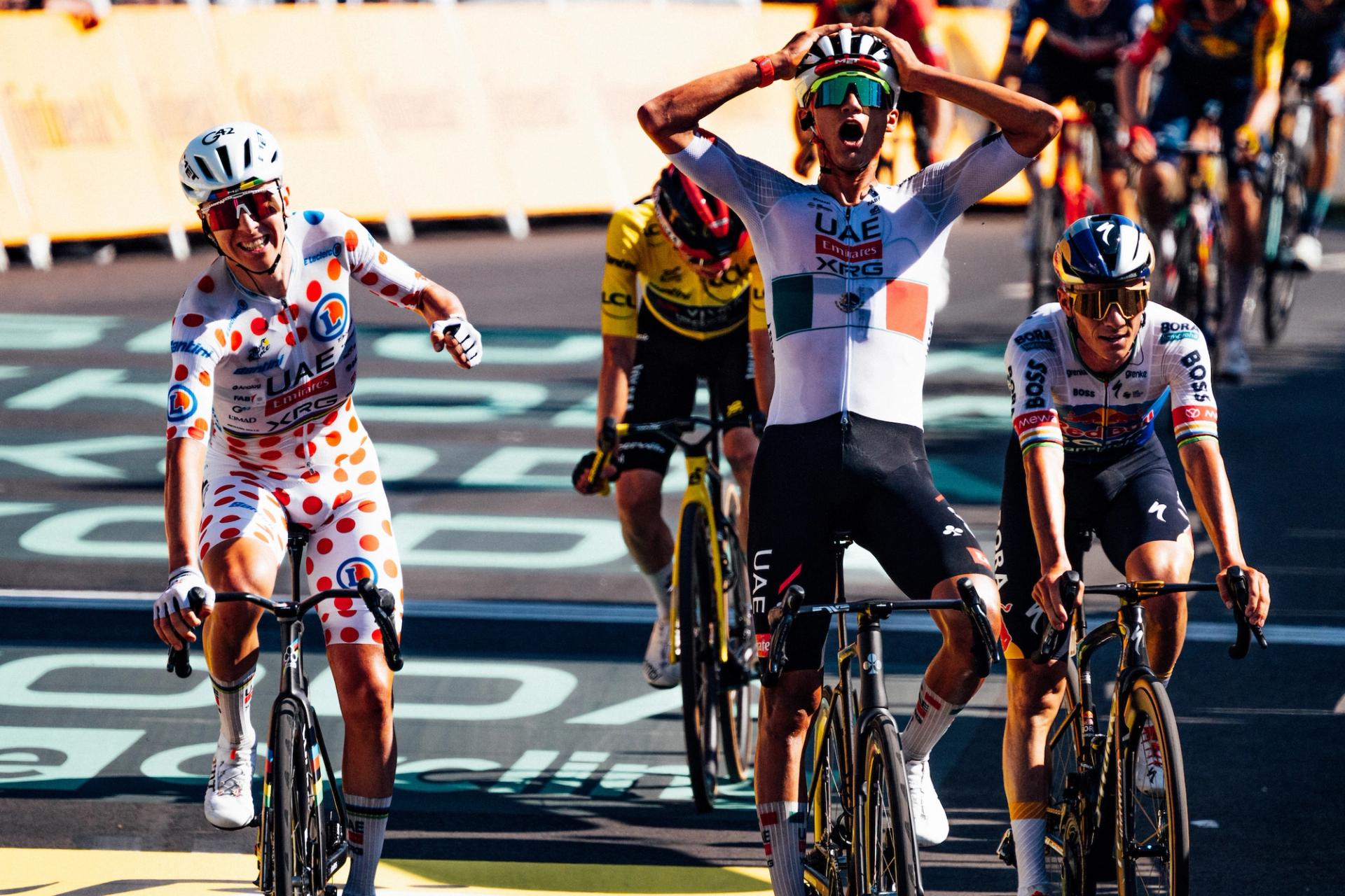 Picture by Zac Williams/SWpix.com - 05/07/2026 - Cycling - 2026 Tour de France - Stage 2 - Tarragona - Barcelona - Isaac Del Toro, UAE Team Emirates, wins Stage 2, with Tadej Pogacar, by his side.