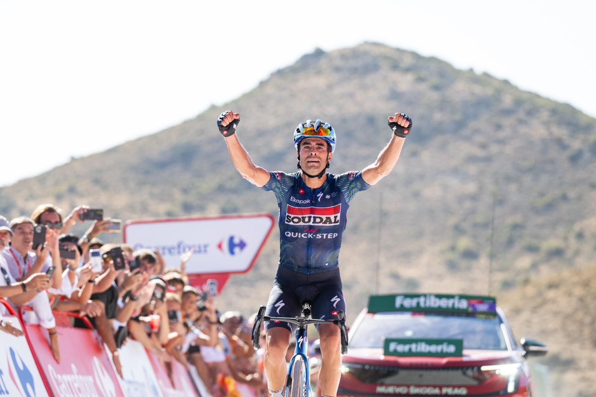 Mikel Landa raises both arms as he wins La Vuelta stage 20 at Collado del Alguacil