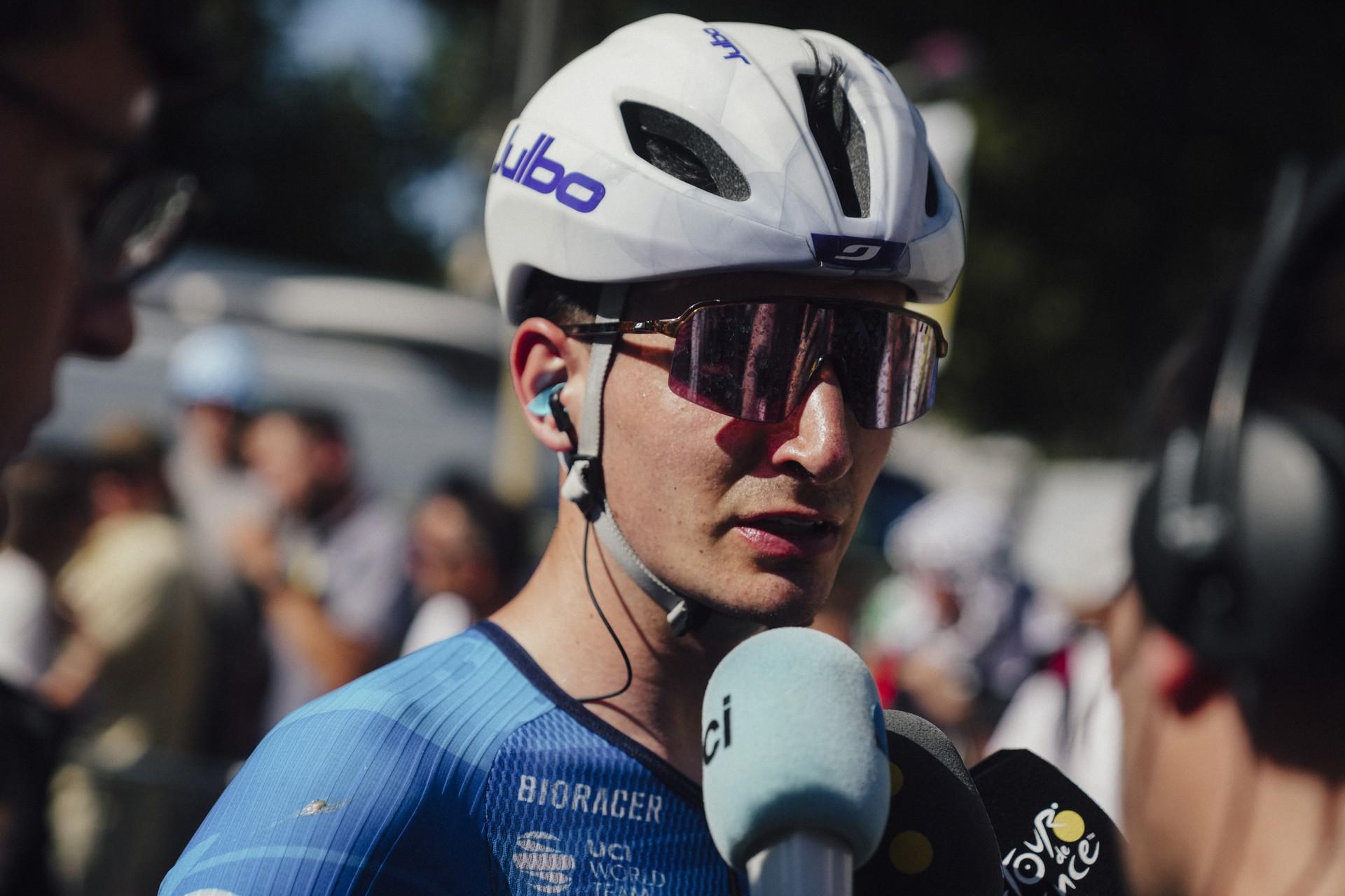 Ewen Costiou in Team Groupama-FDJ kit at the Tour de France mixed zone after Stage 4 Carcassonne–Foix