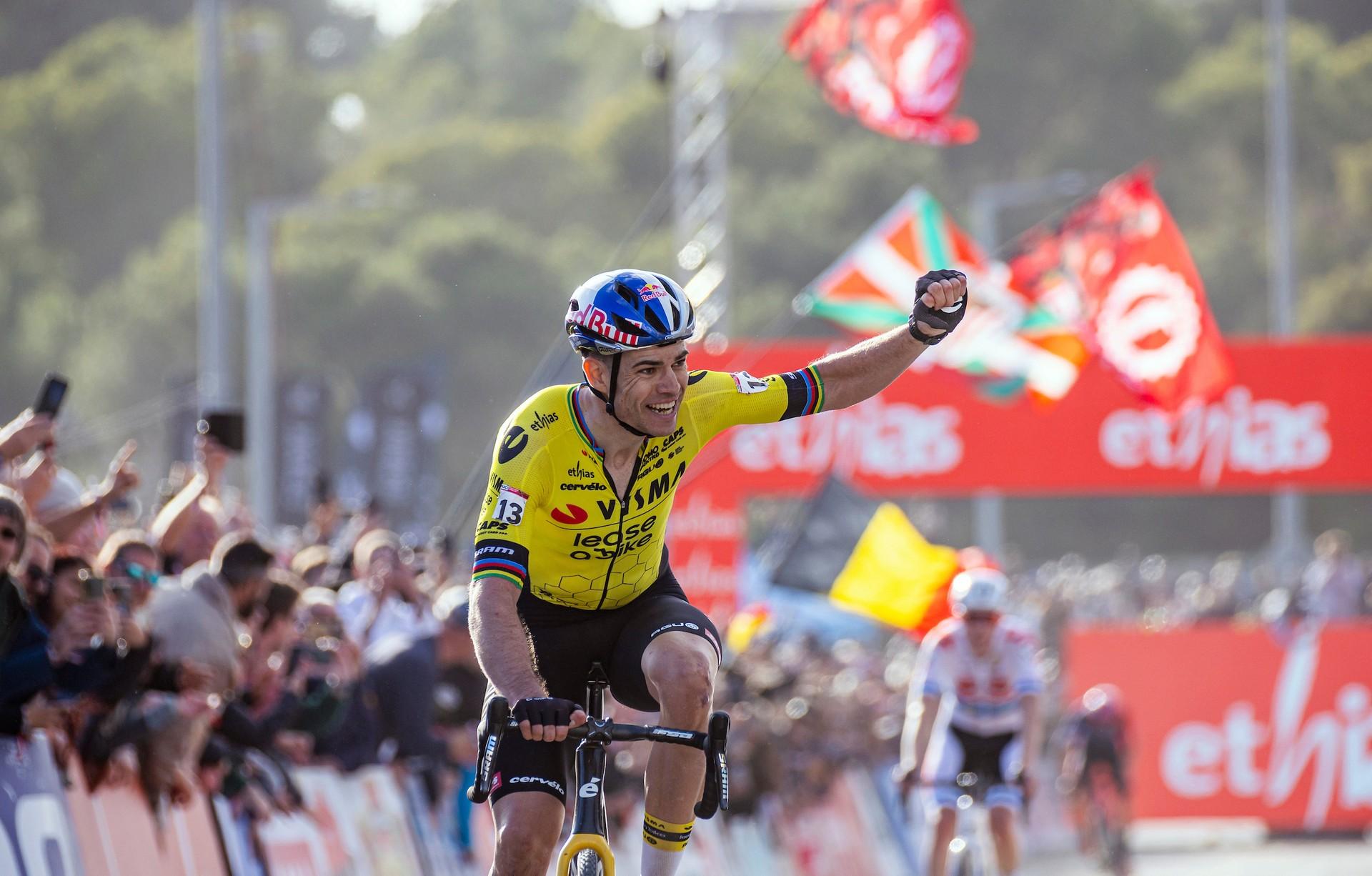 Wout van Aert celebrates cyclo-cross win in Benidorm with victory fist.