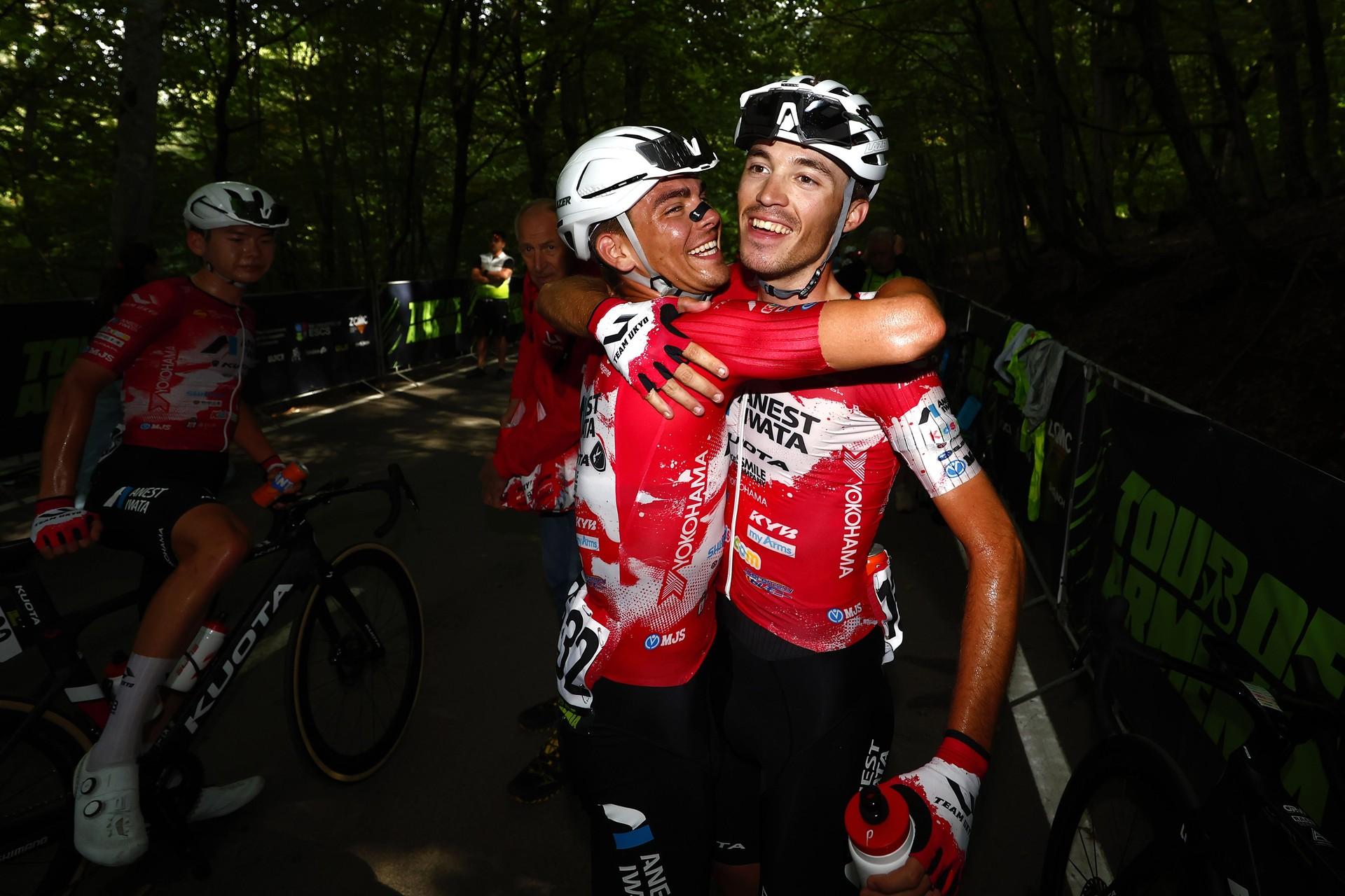 Team UKYO cyclists Federico Iacomoni and Simone Raccani embrace after the Tour of Armenia stage