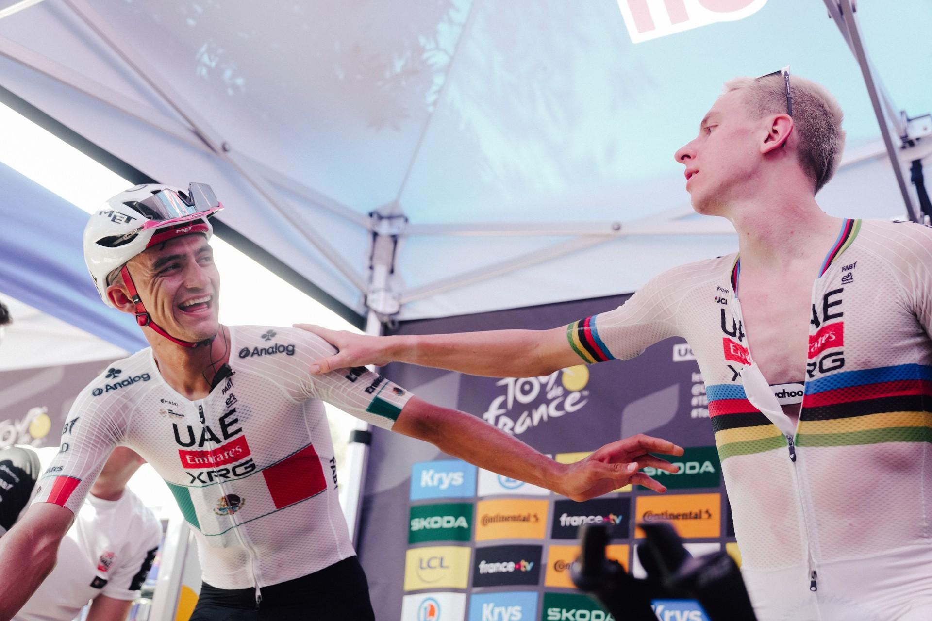 Tadej Pogačar celebrates his Tour de France stage win at the Gavarnie-Gèdre finish with raised arms