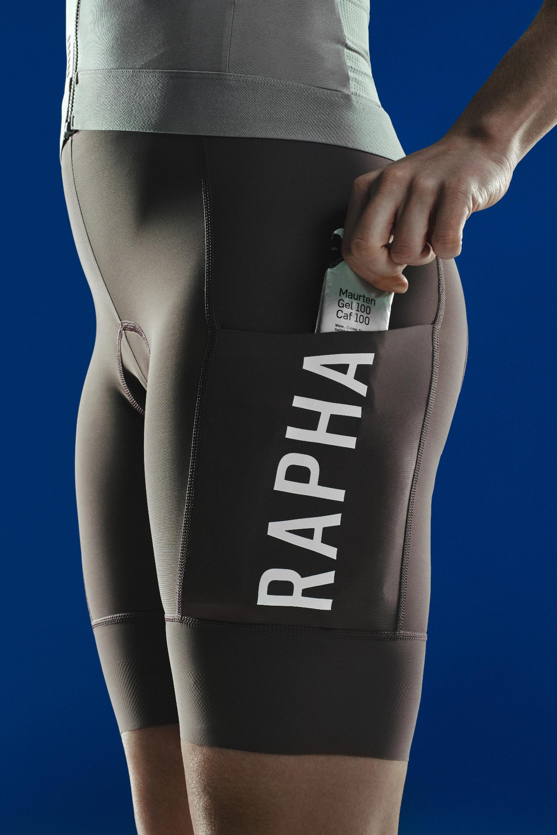 A woman wearing Rapha Cargo shorts