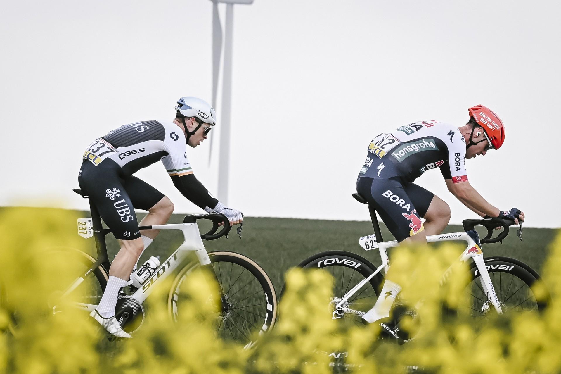 Lazkano and Townsend racing through yellow fields at Paris-Roubaix (62 chars)