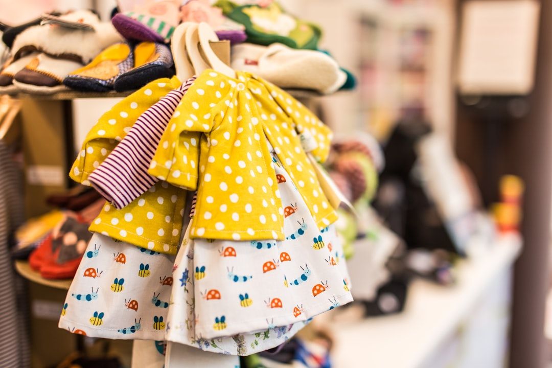 A vibrant stack of children's clothing sets, showcasing variety and appeal.