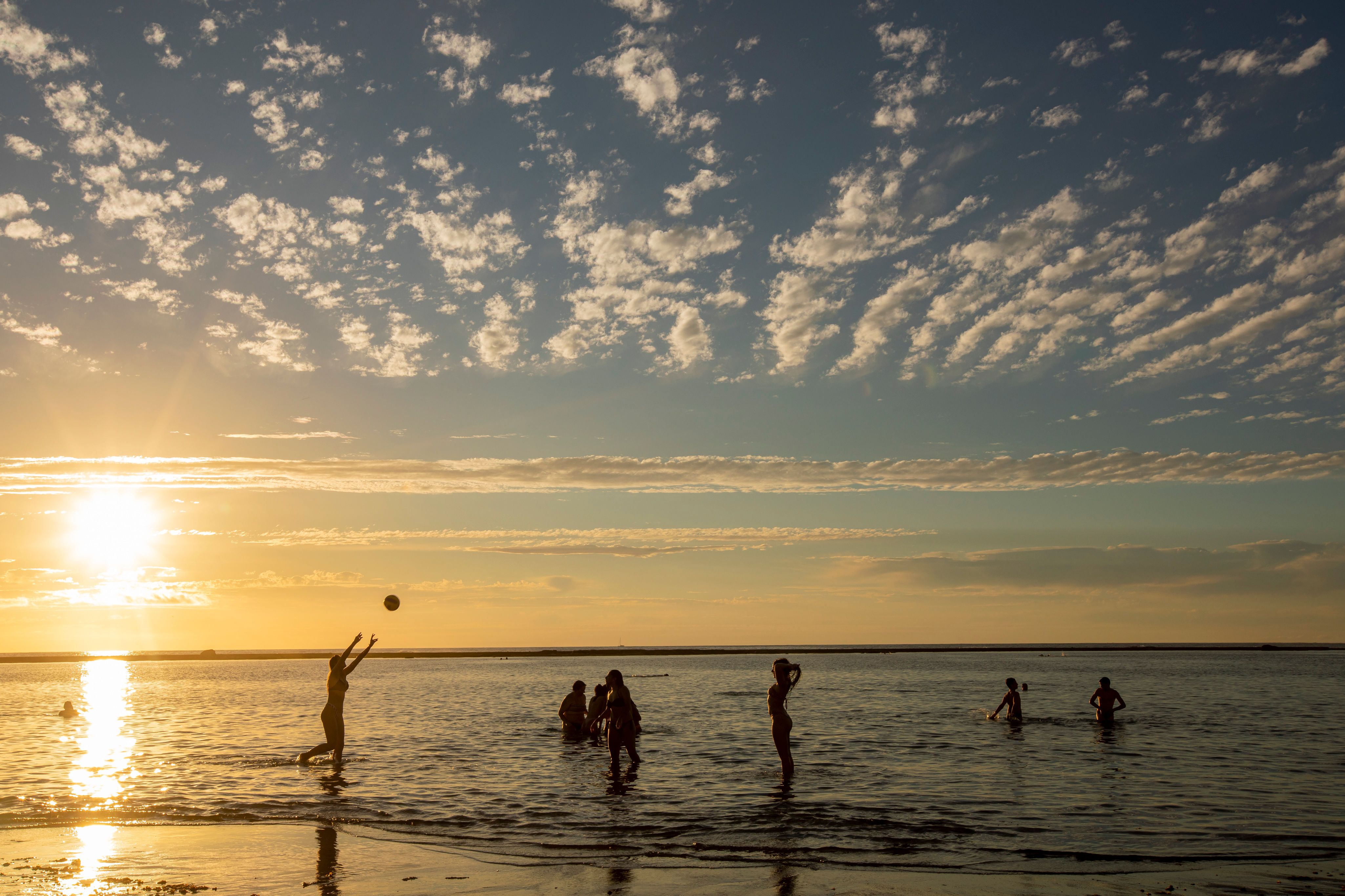 Beach volleyball at sunset on Las Canteras.