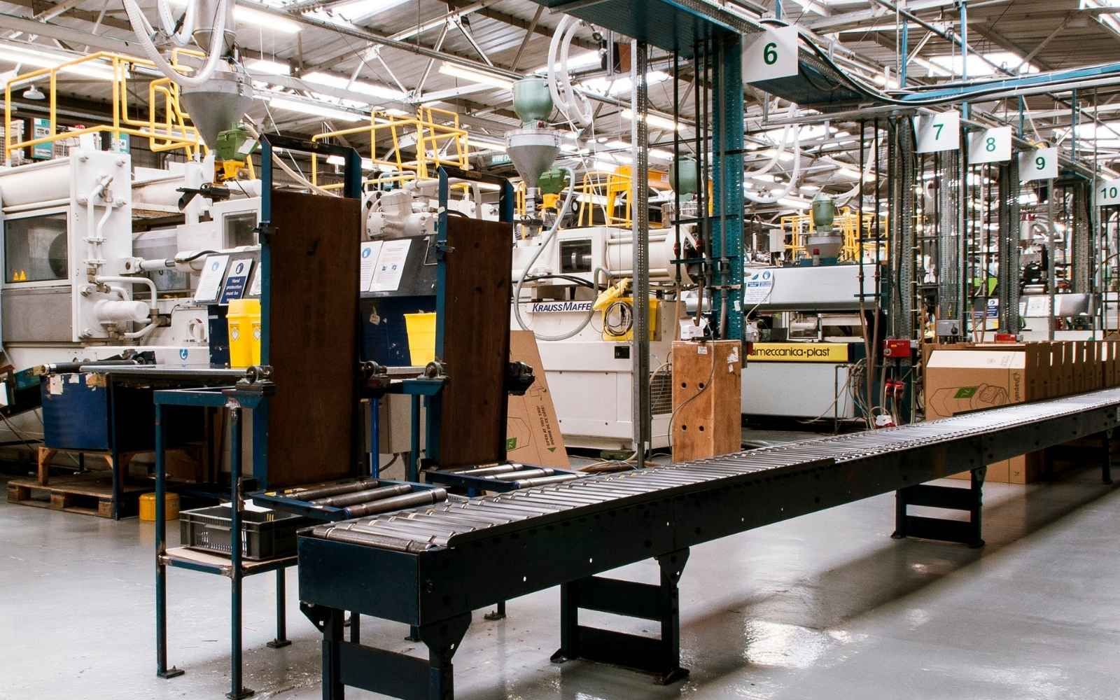Large-scale UK manufacturing facility with conveyor systems and industrial machinery