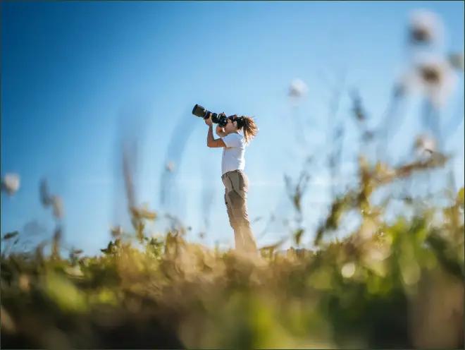 Person holding an OM SYSTEM OM-1 Mark II