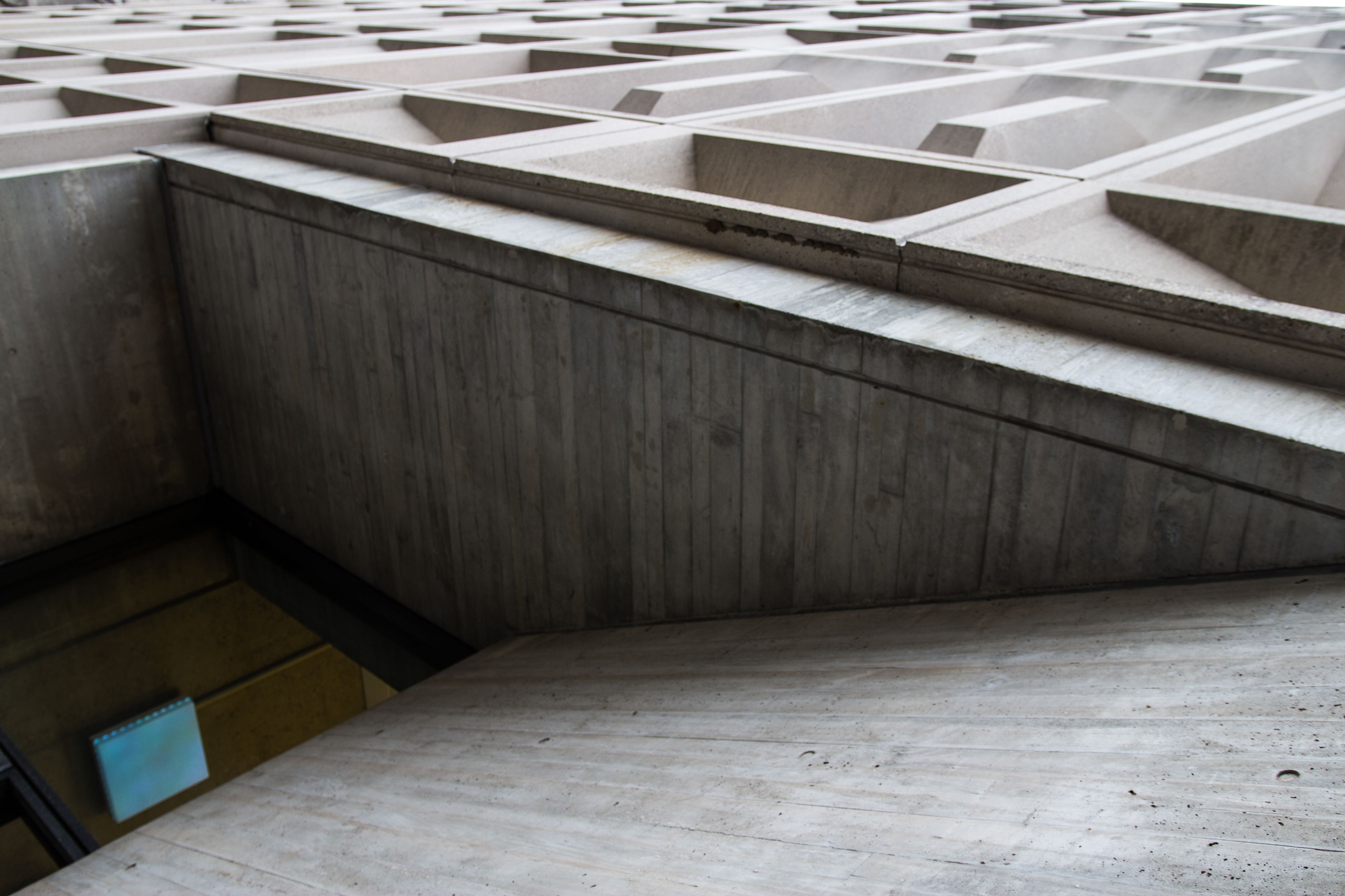 A modern concrete building, photographed at an angle that makes it unclear which way is up.