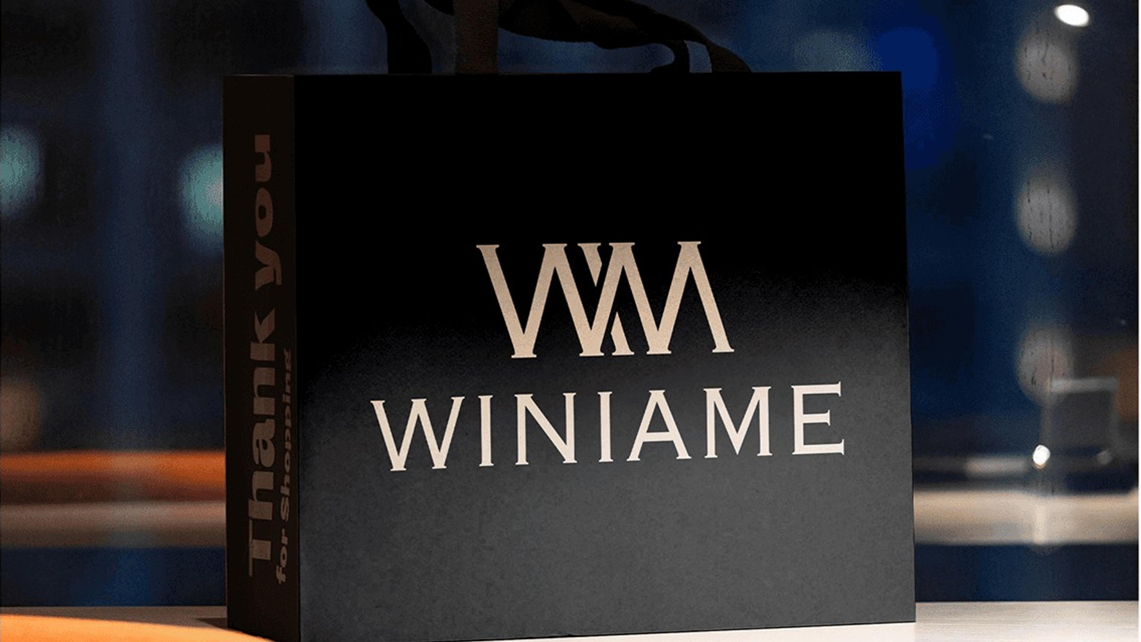 Black Winiame shopping bag with the gold monogram