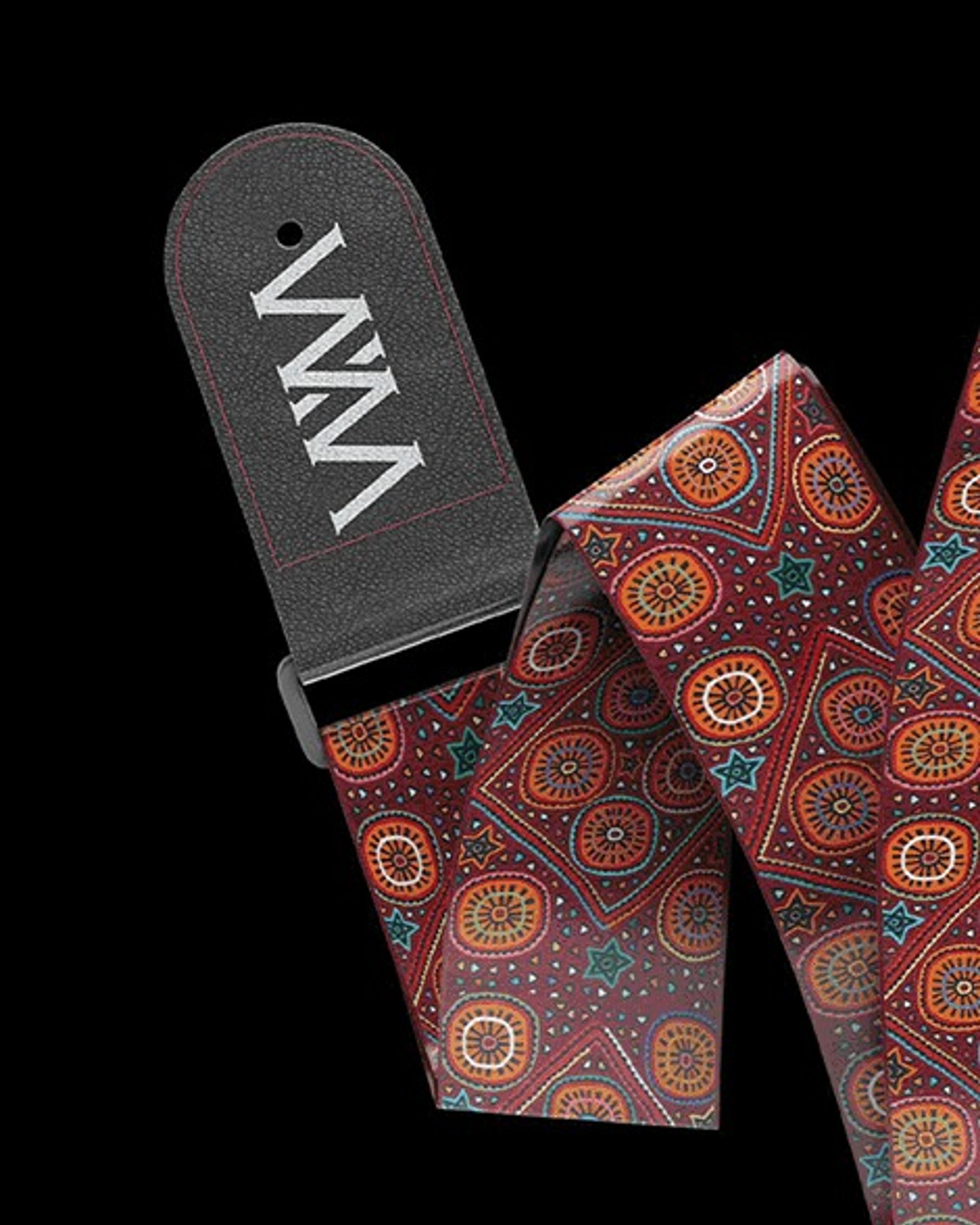 Patterned strap with the monogram on leather