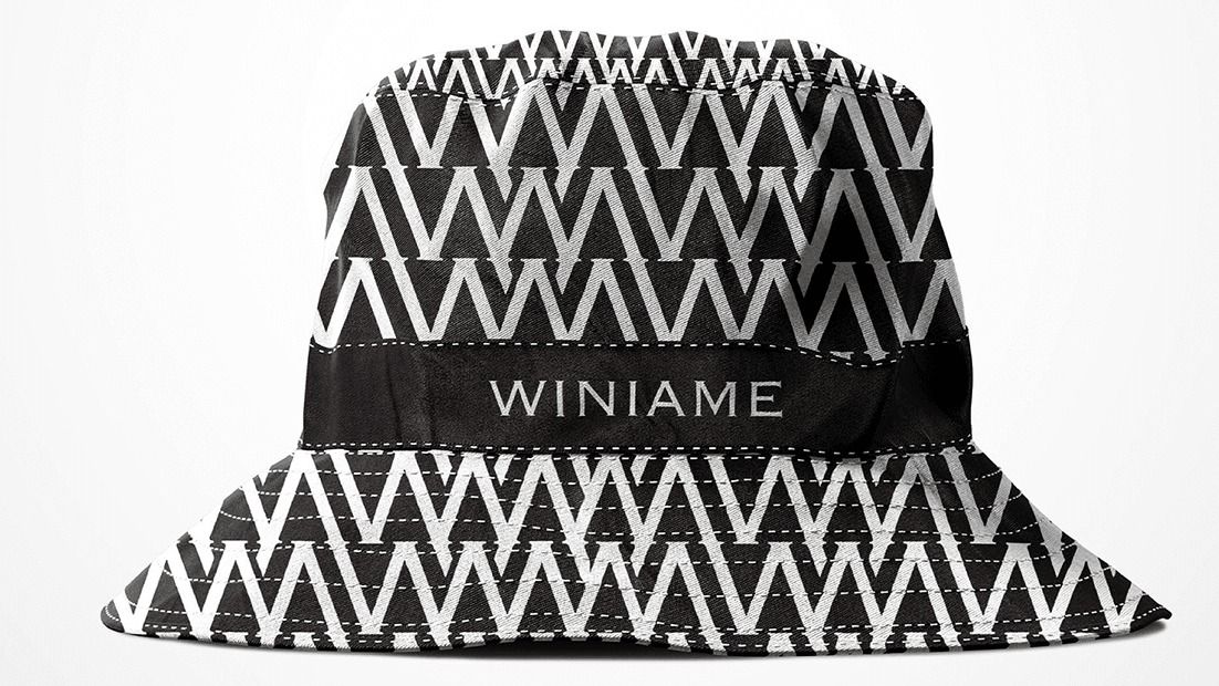 Zigzag bucket hat with a Winiame band on white