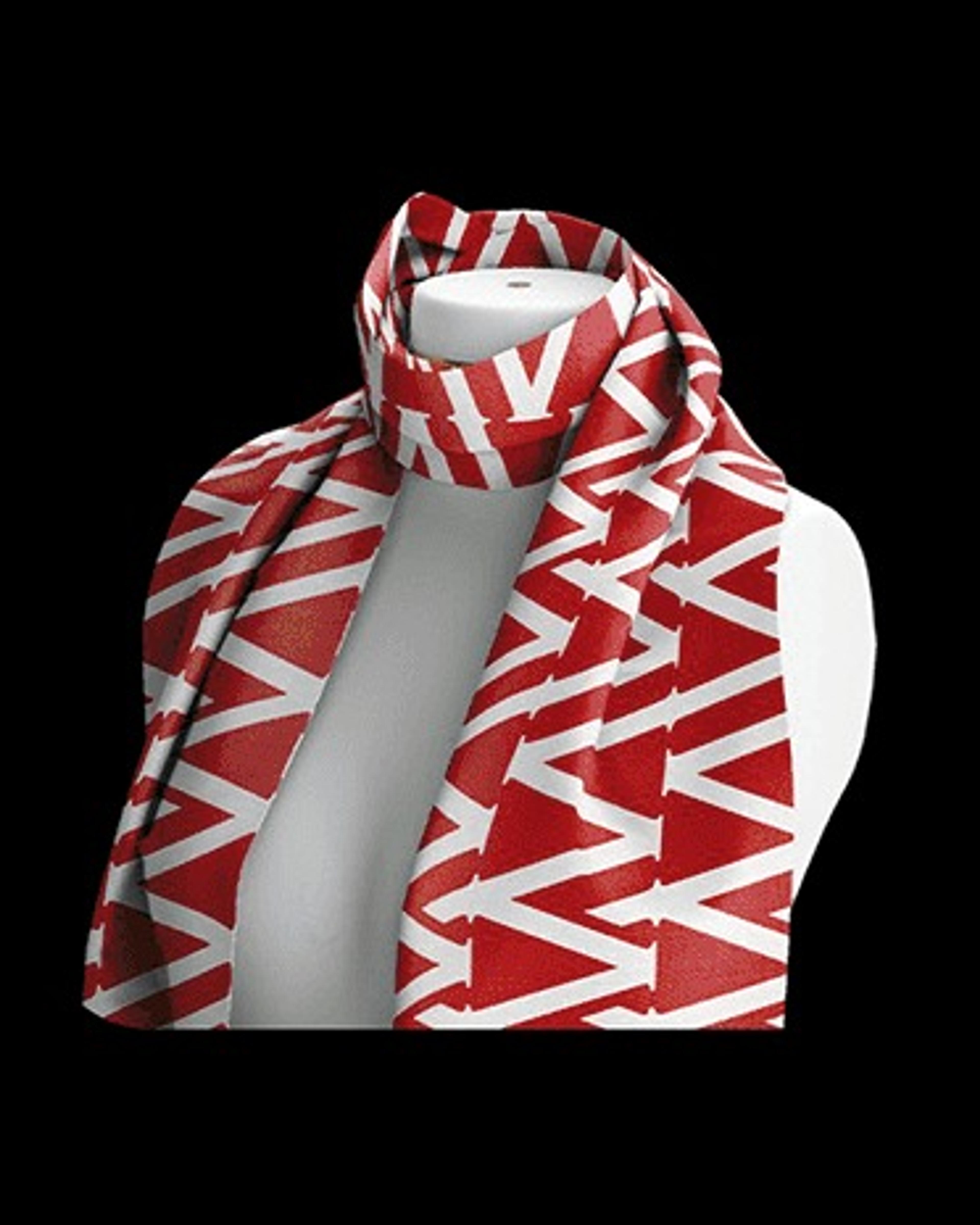 Red and white zigzag scarf on a display bust