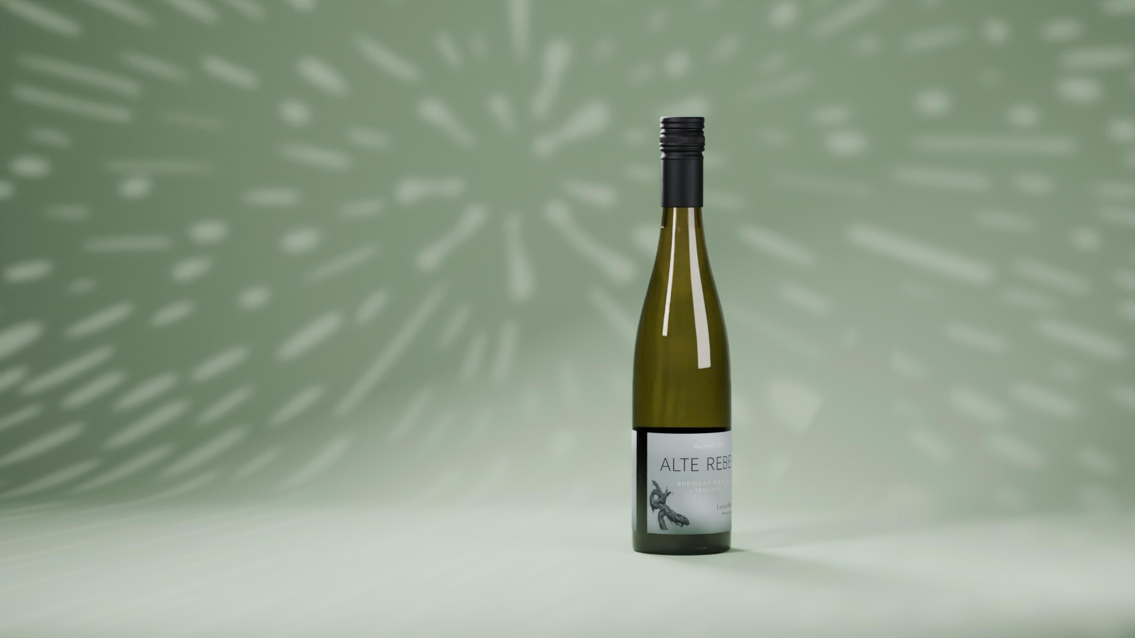 The 3D Alte Reben Riesling bottle turning from a white wireframe into real glass on sage green