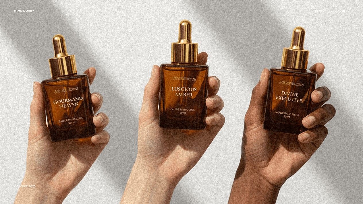 Three hands holding Gourmand Heaven, Luscious Amber and Divine Executive bottles