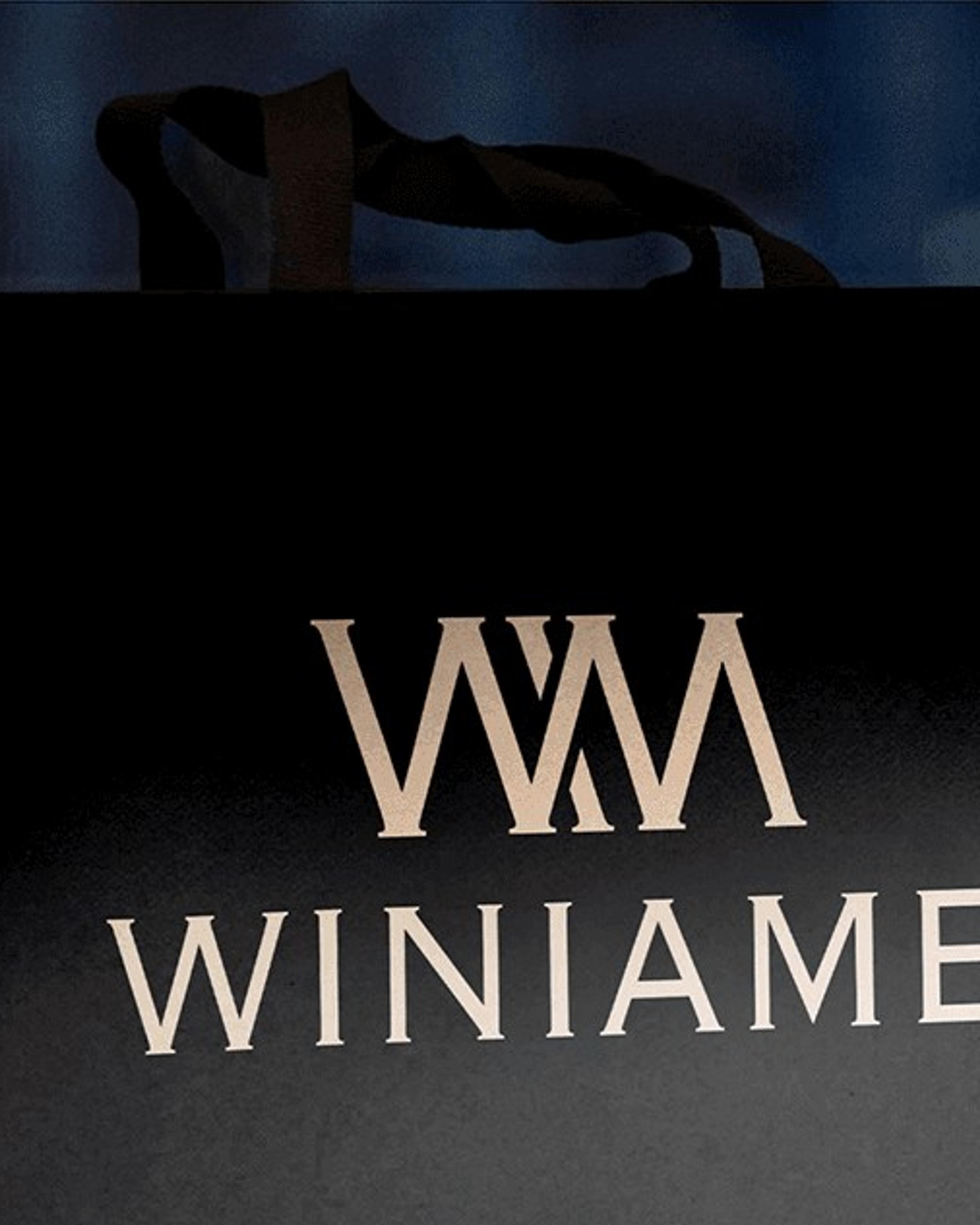 Black Winiame shopping bag with the gold WM monogram