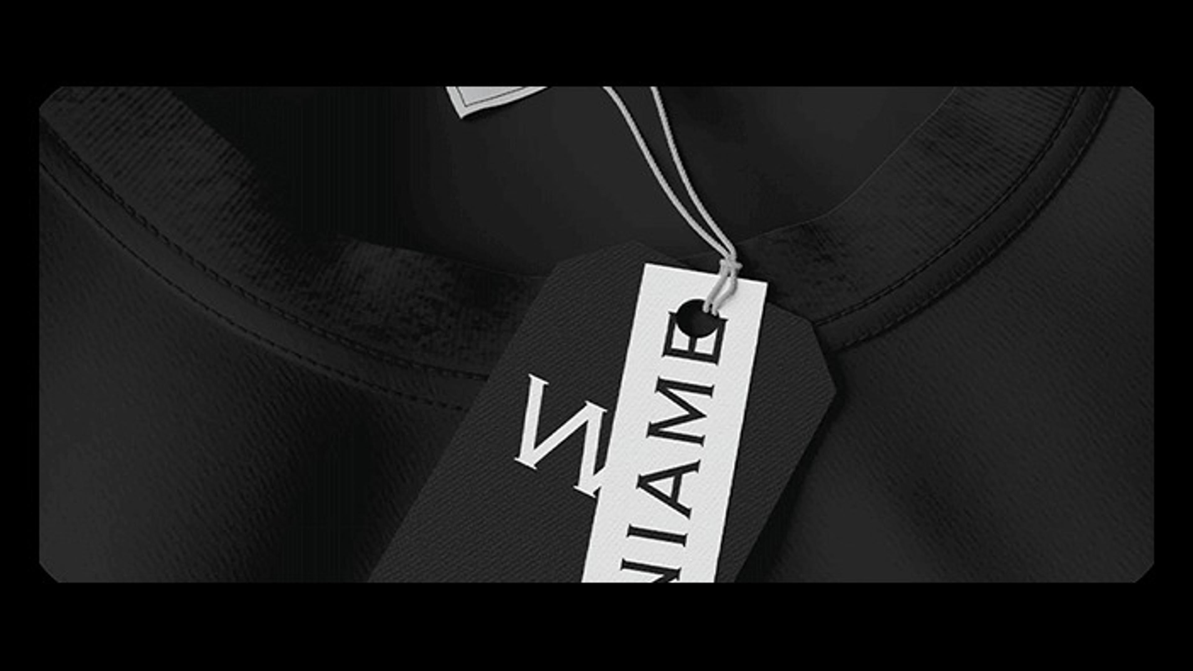 Winiame swing tag on a black garment