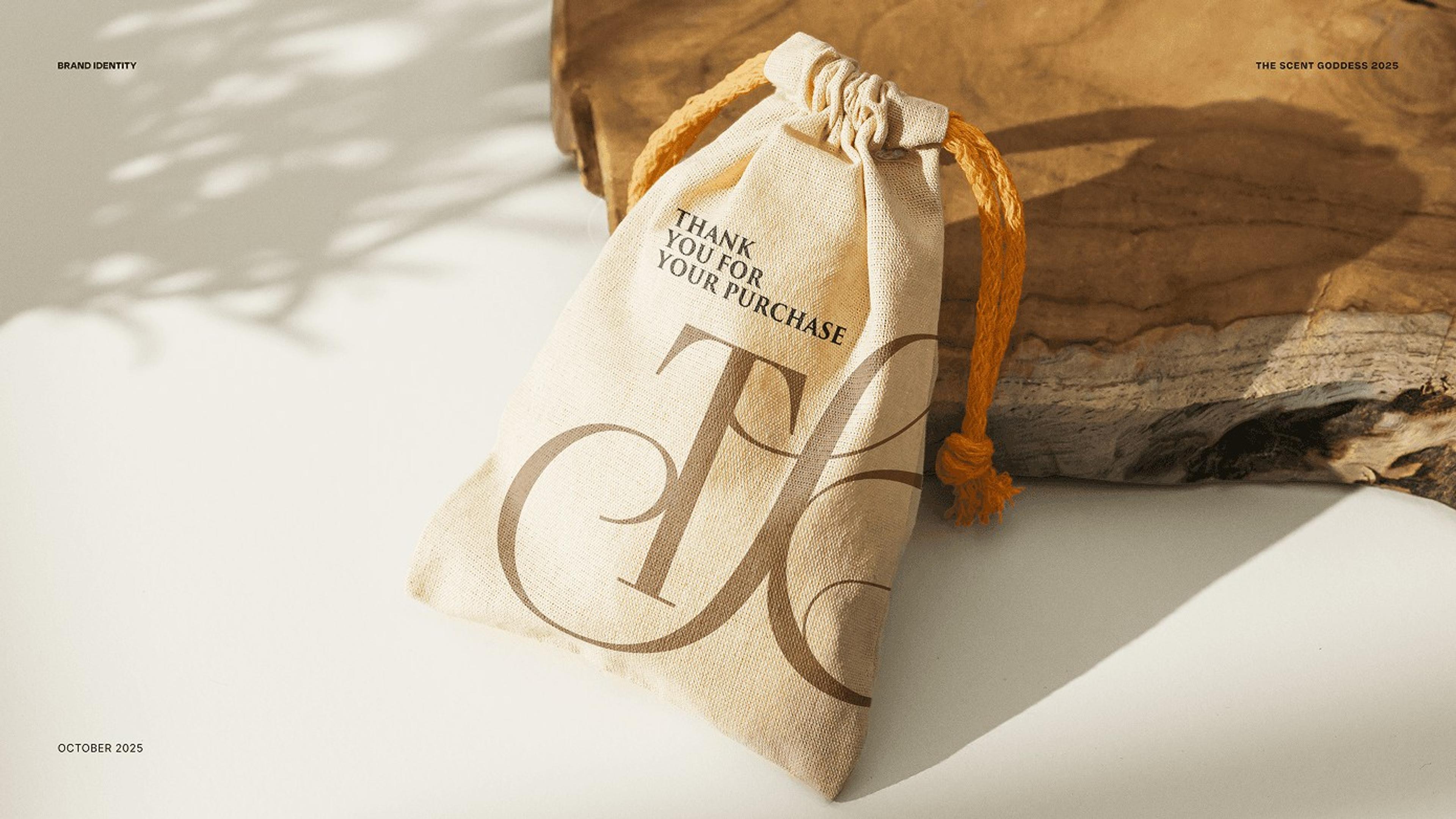 Linen gift pouch printed with the monogram and a thank you message