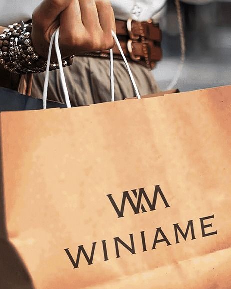 Kraft paper bag with the Winiame logo