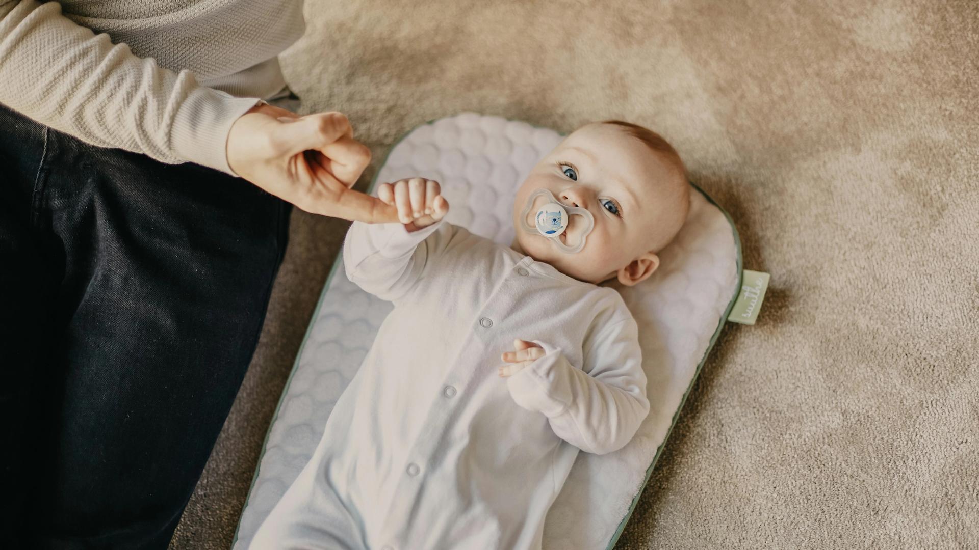 infant playing