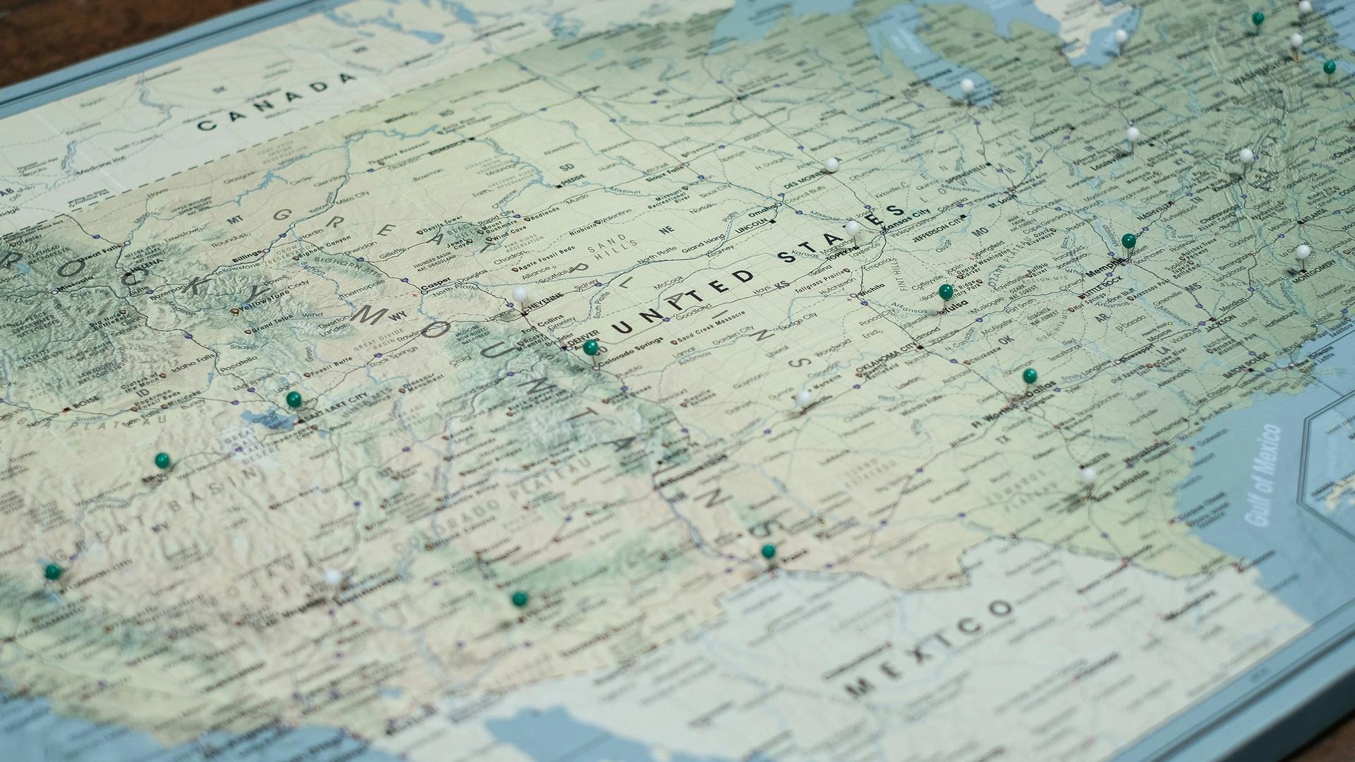 A map of the united states on a wooden table