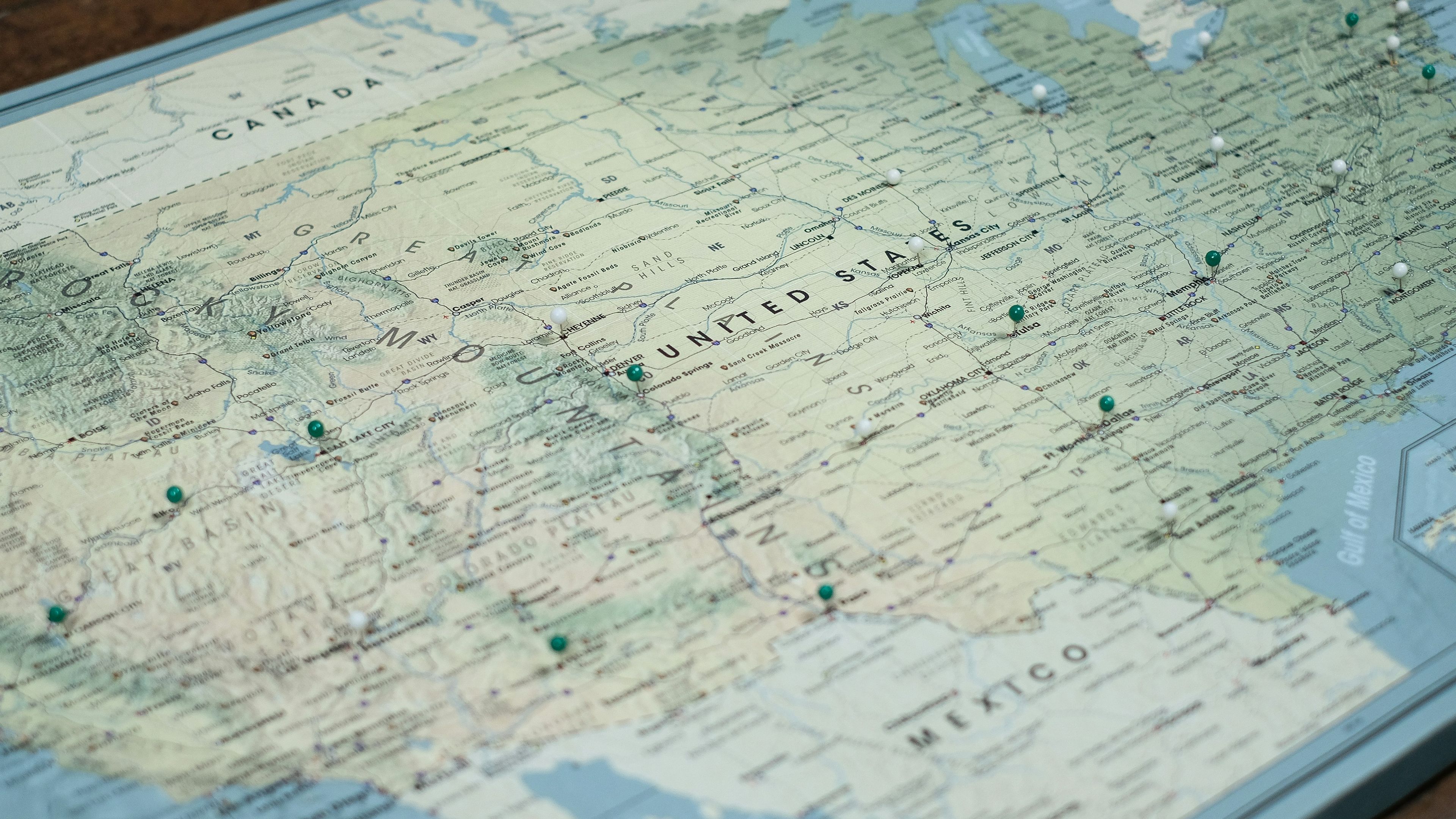 A map of the united states on a wooden table