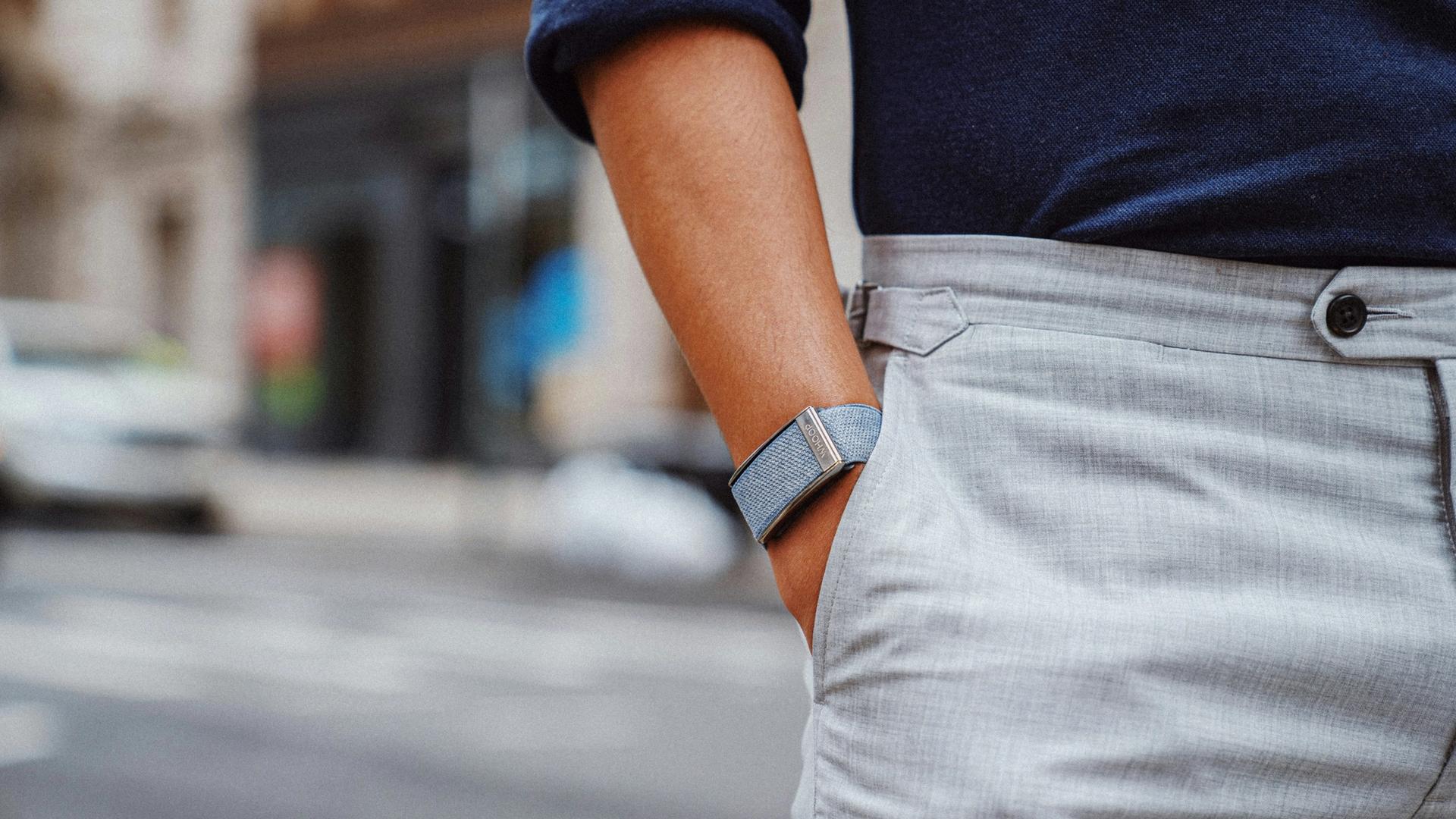 Man with wearable on wrist