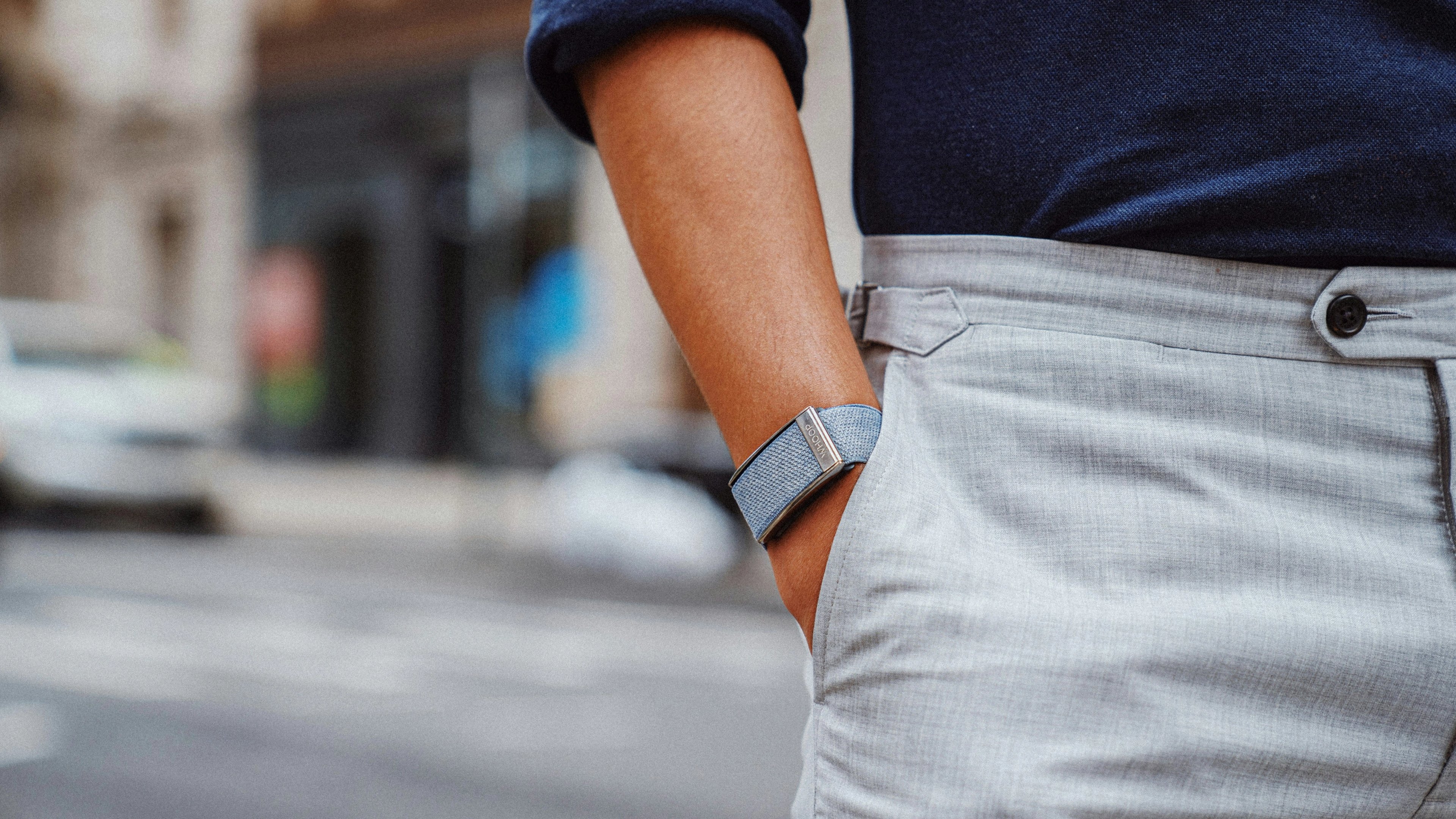 Man with wearable on wrist