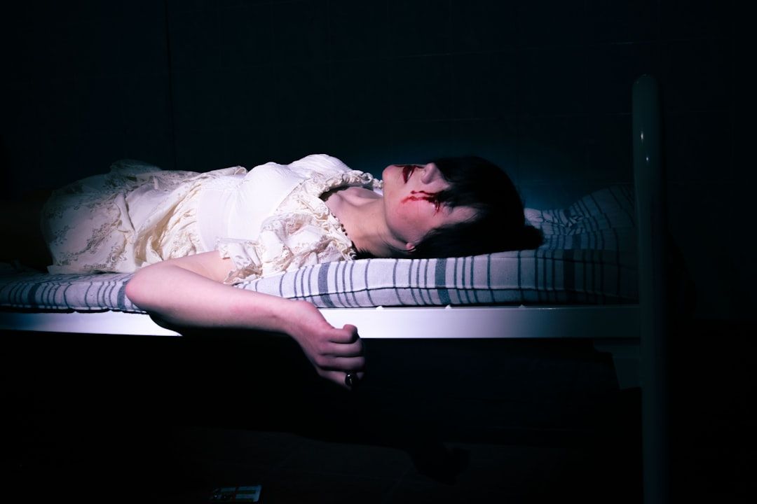 a girl in a white dress in a mental hospital, a member of a musical group, horror - Photo by Елизавета Крылова on Unsplash