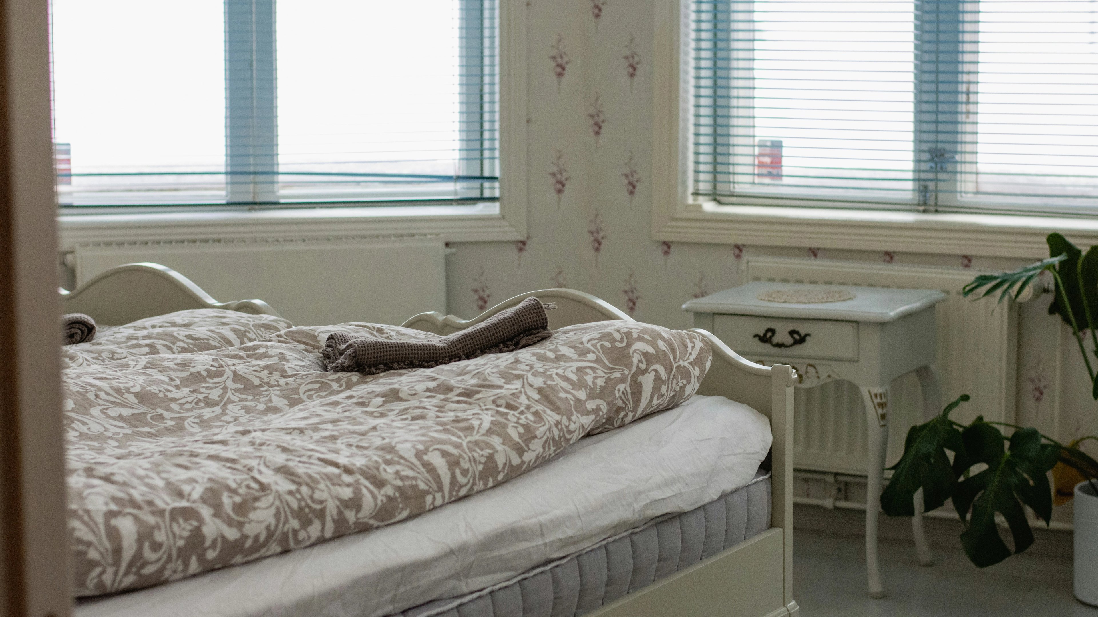 Empty old bedroom daytime