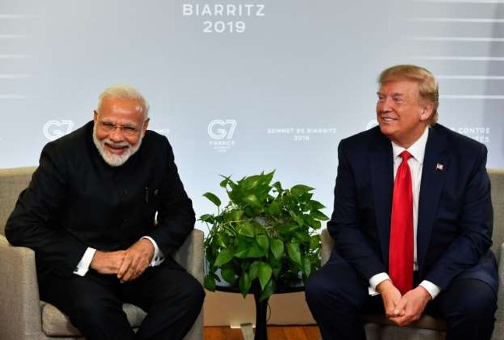 Image for Agence France-Presse: In show of bond, Trump to join Modi in mass Houston rally