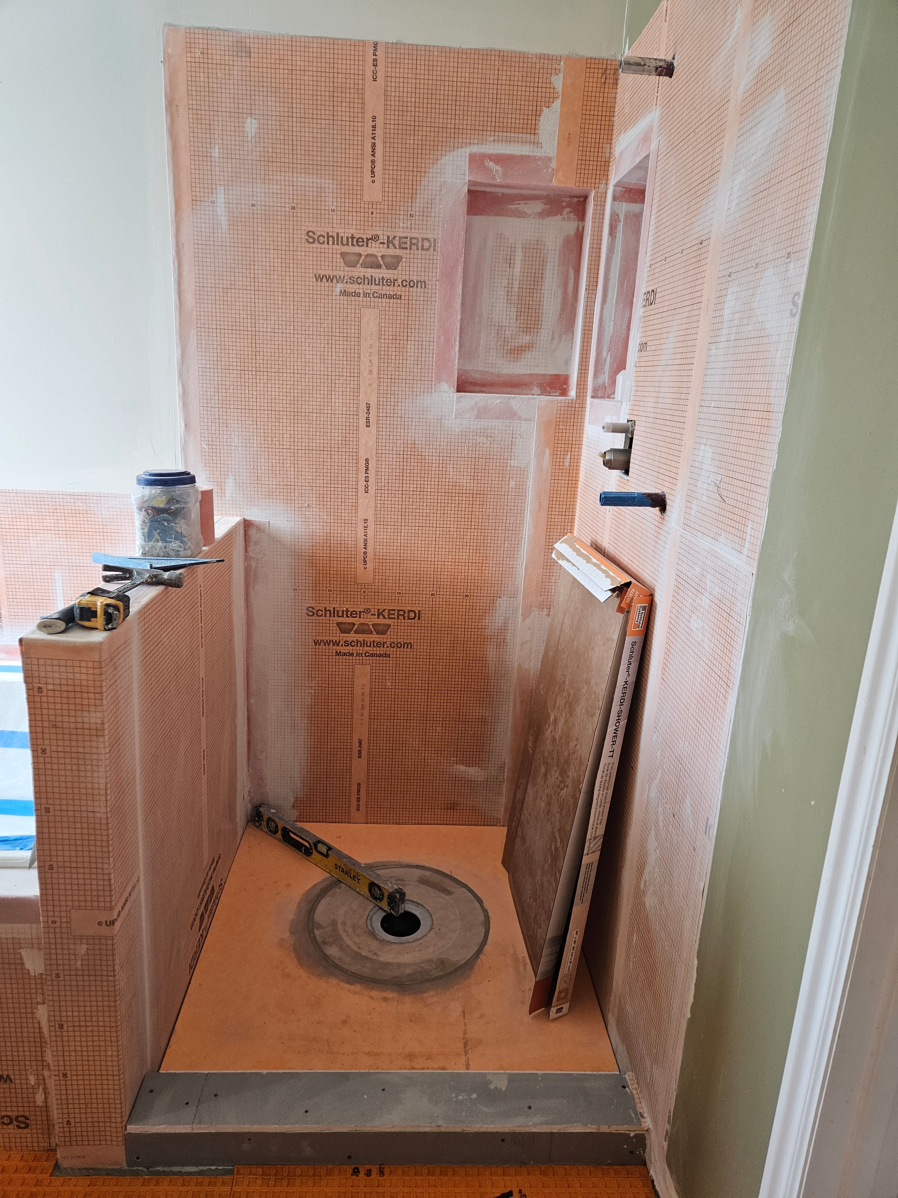 Shower waterproofing completed with Schluter Kerdi system during bathroom remodel in Murray, Utah. 121935