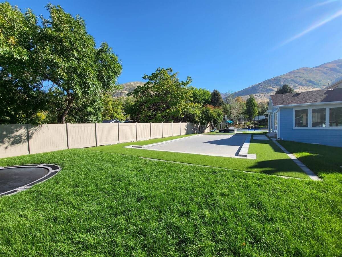 Sod installation with custom sprinkler system in Sandy, Utah.