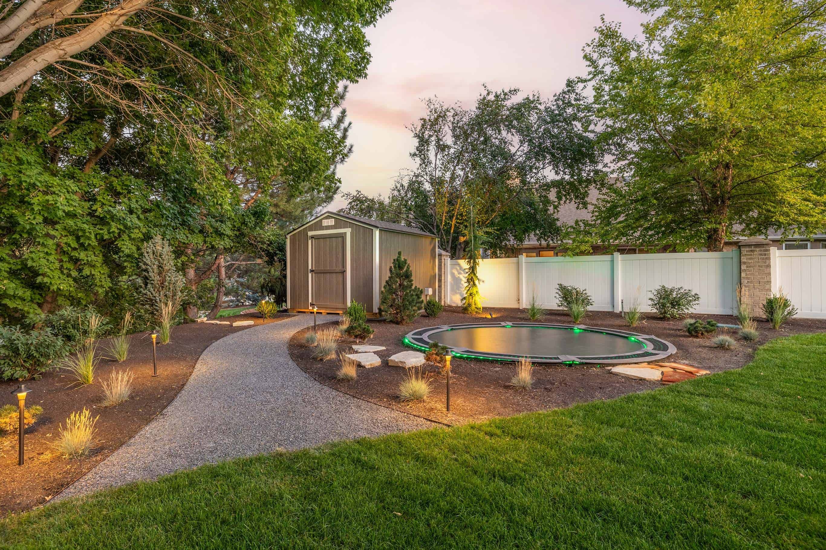 Gravel Walkway with Shed and Mulch Landscape Design in Murray