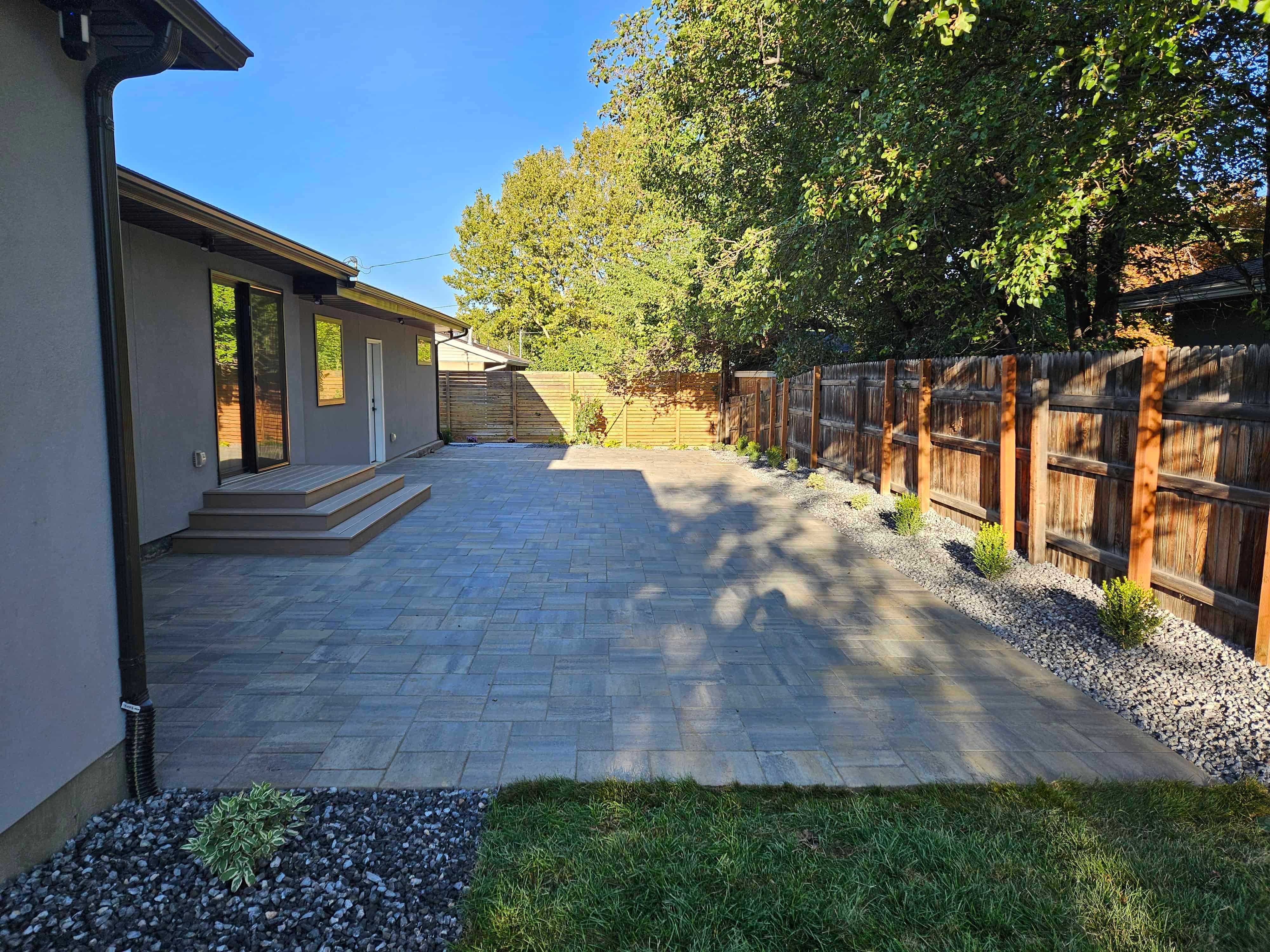 Pavers patio with a small composite deck in Murray, Utah
