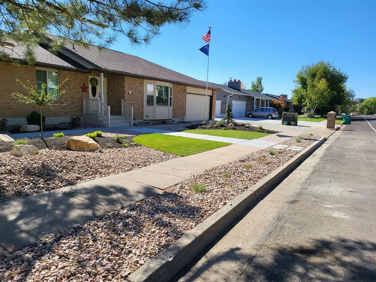 Sustainable xeriscaping installation with water-efficient landscaping in Salt Lake City.