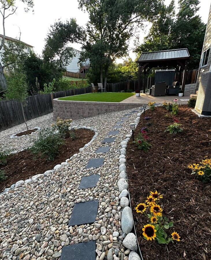 Xeriscaping design with a gravel pathway in Millcreek, Utah.